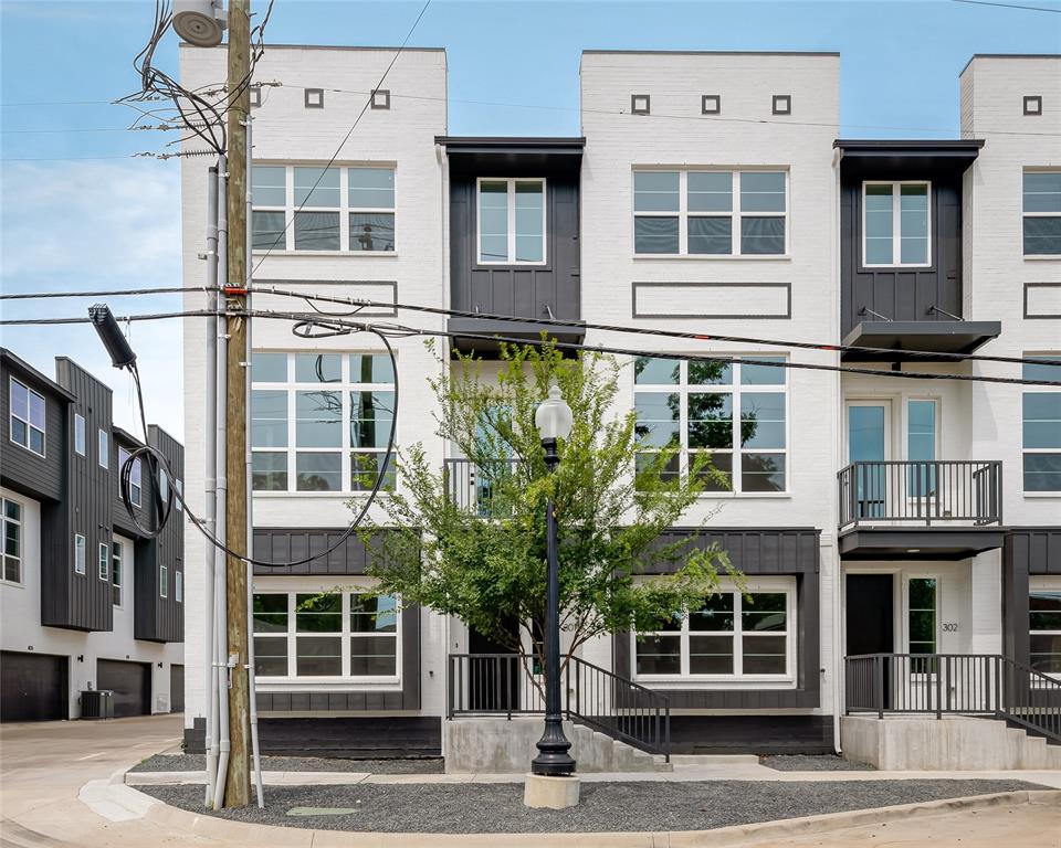 13325 Bee Street, Unit 302 Farmers Branch, TX 75234 - Photo 22 of 23 a front view of a building with a window