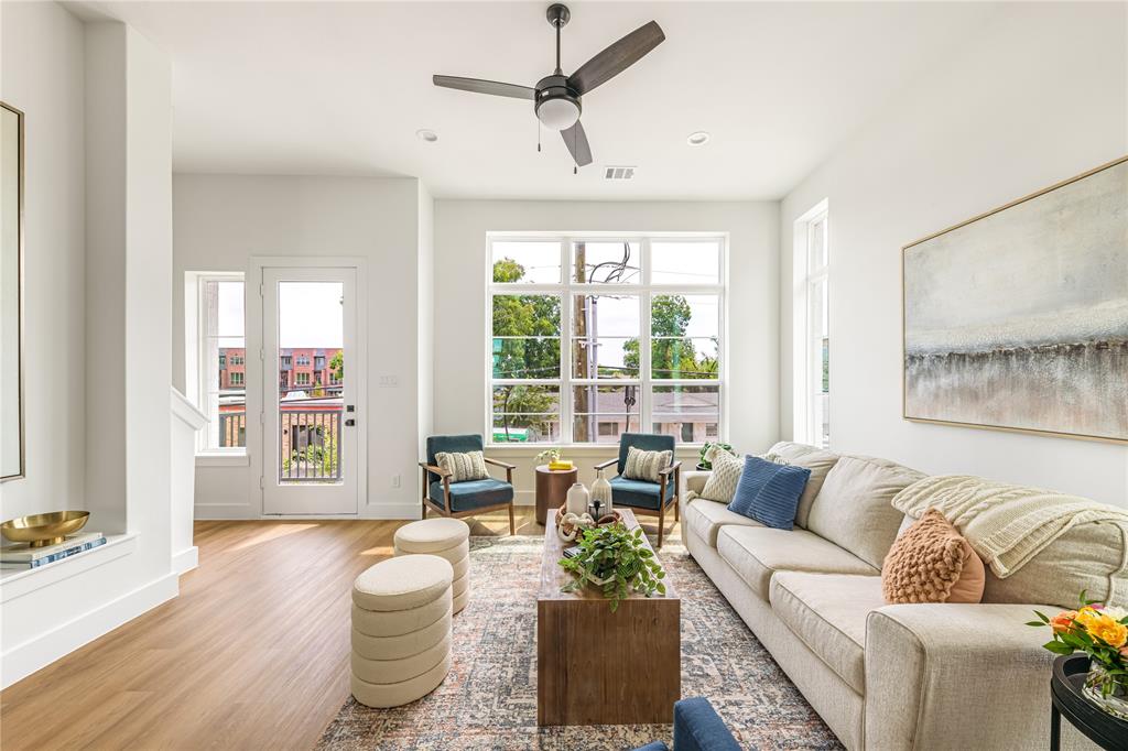 13325 Bee Street, Unit 302 Farmers Branch, TX 75234 - Photo 10 of 23 a living room with furniture and a large window