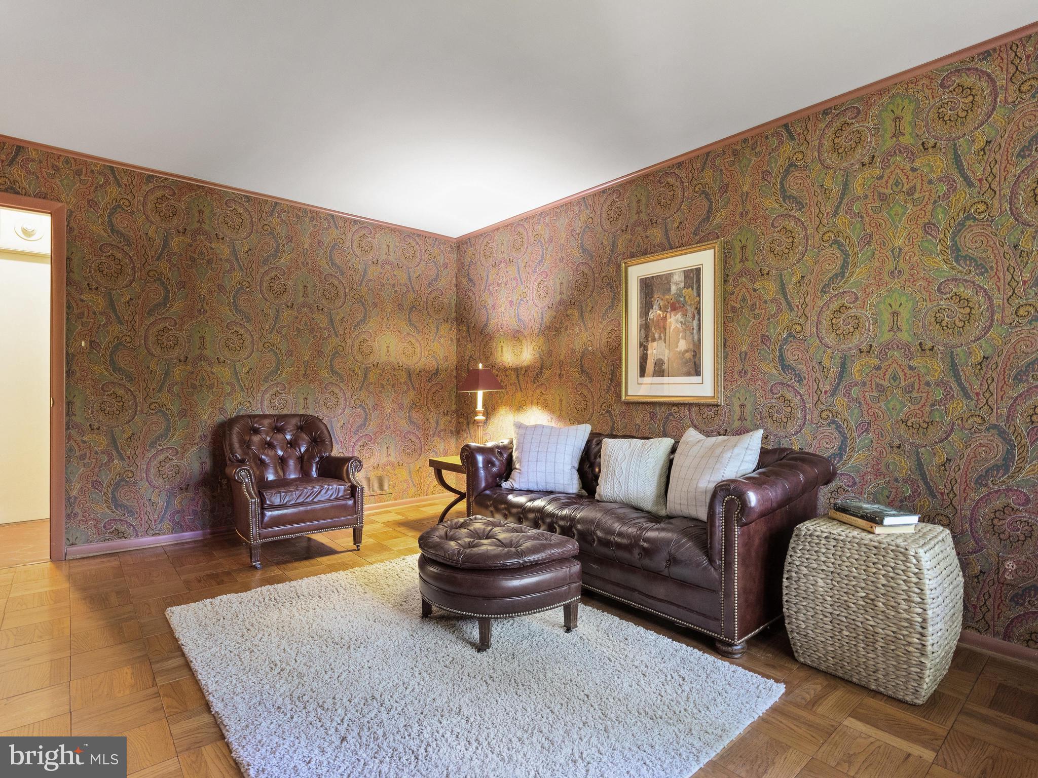 10420 Glen Road Potomac, MD 20854 - Photo 13 of 54 a living room with furniture and a couch