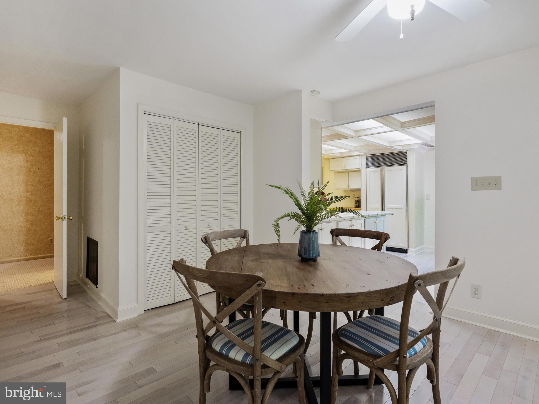 10420 Glen Road Potomac, MD 20854 - Photo 31 of 54 a view of a dining room with furniture and wooden floor