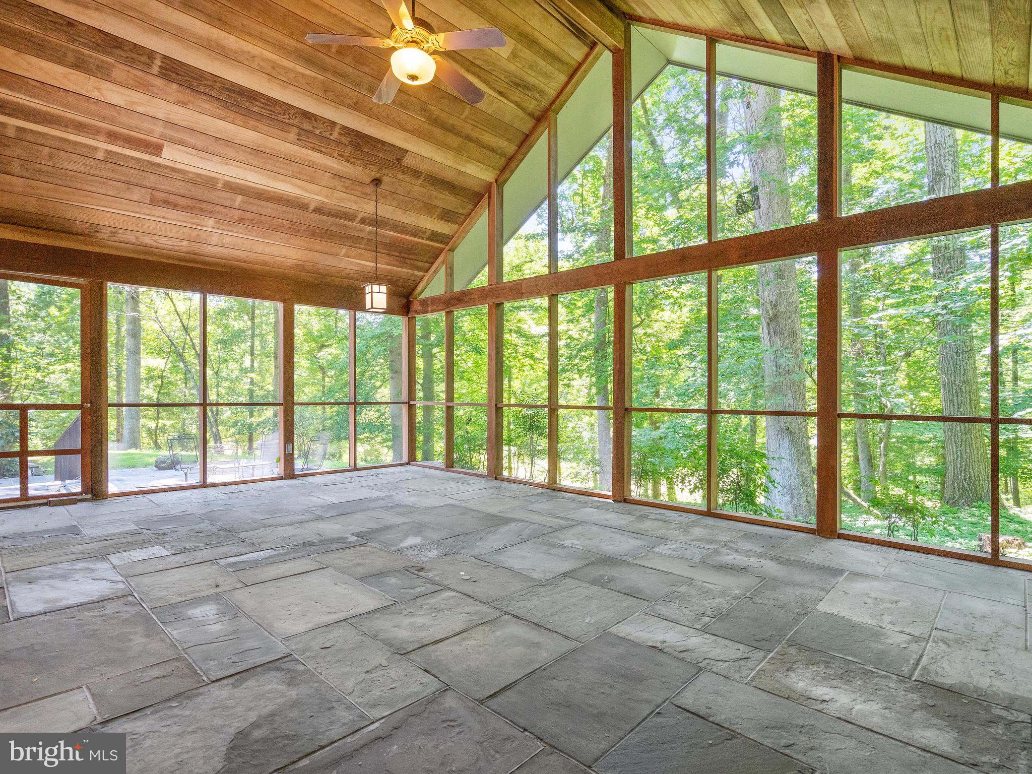 10420 Glen Road Potomac, MD 20854 - Photo 32 of 54 a view of an empty room with a large window