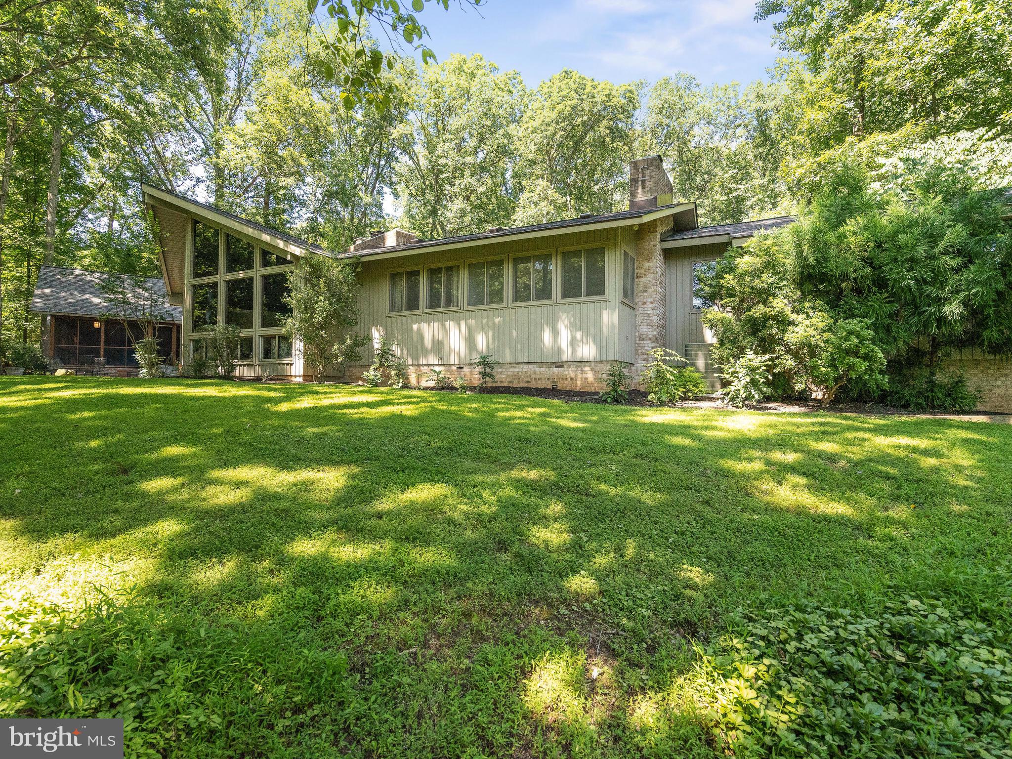 10420 Glen Road Potomac, MD 20854 - Photo 45 of 54 a view of a house with a yard