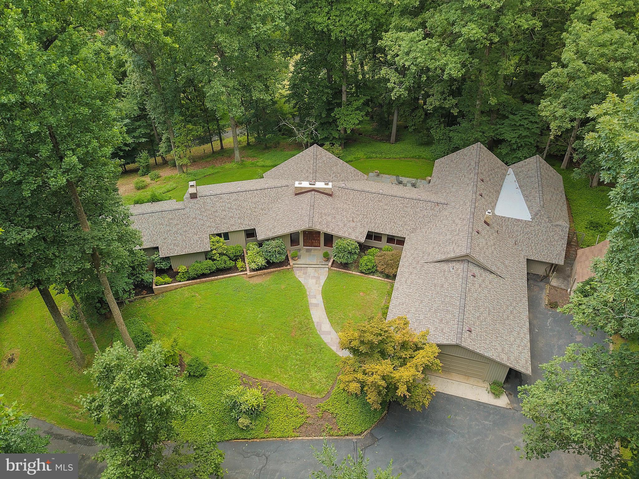 10420 Glen Road Potomac, MD 20854 - Photo 47 of 54 an aerial view of a house with a yard swimming pool and outdoor seating