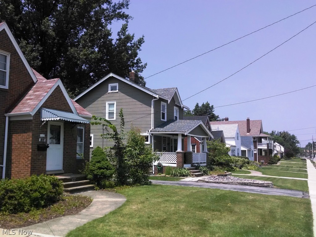 1404 South Green Road Cleveland, OH 44121 - Photo 23 of 23 Welcoming street view, sidewalks