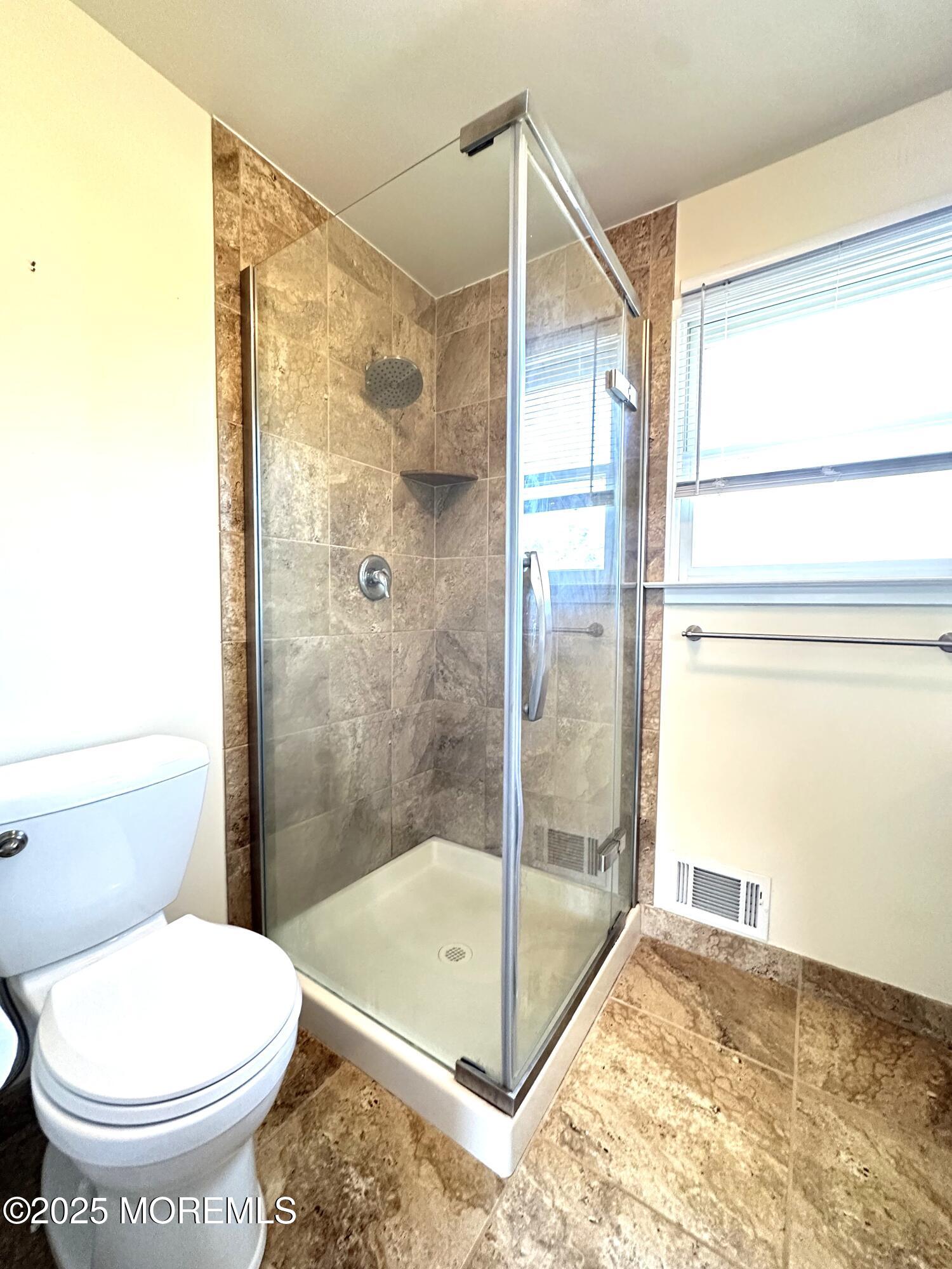 45 Springhill Drive Howell, NJ 07731 - Photo 12 of 22 a bathroom with a shower and a toilet