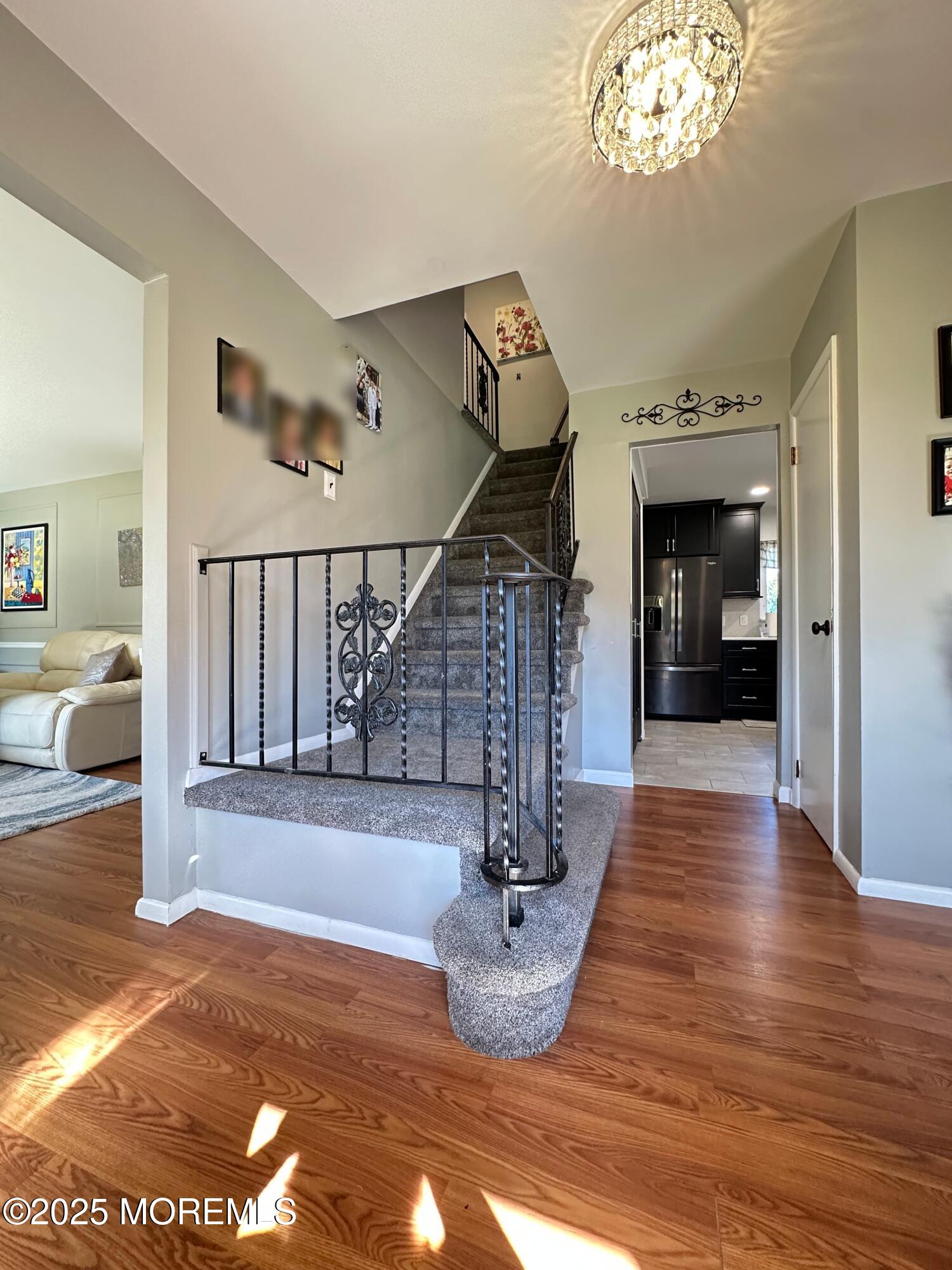 45 Springhill Drive Howell, NJ 07731 - Photo 2 of 22 a view of entryway and hall with wooden floor