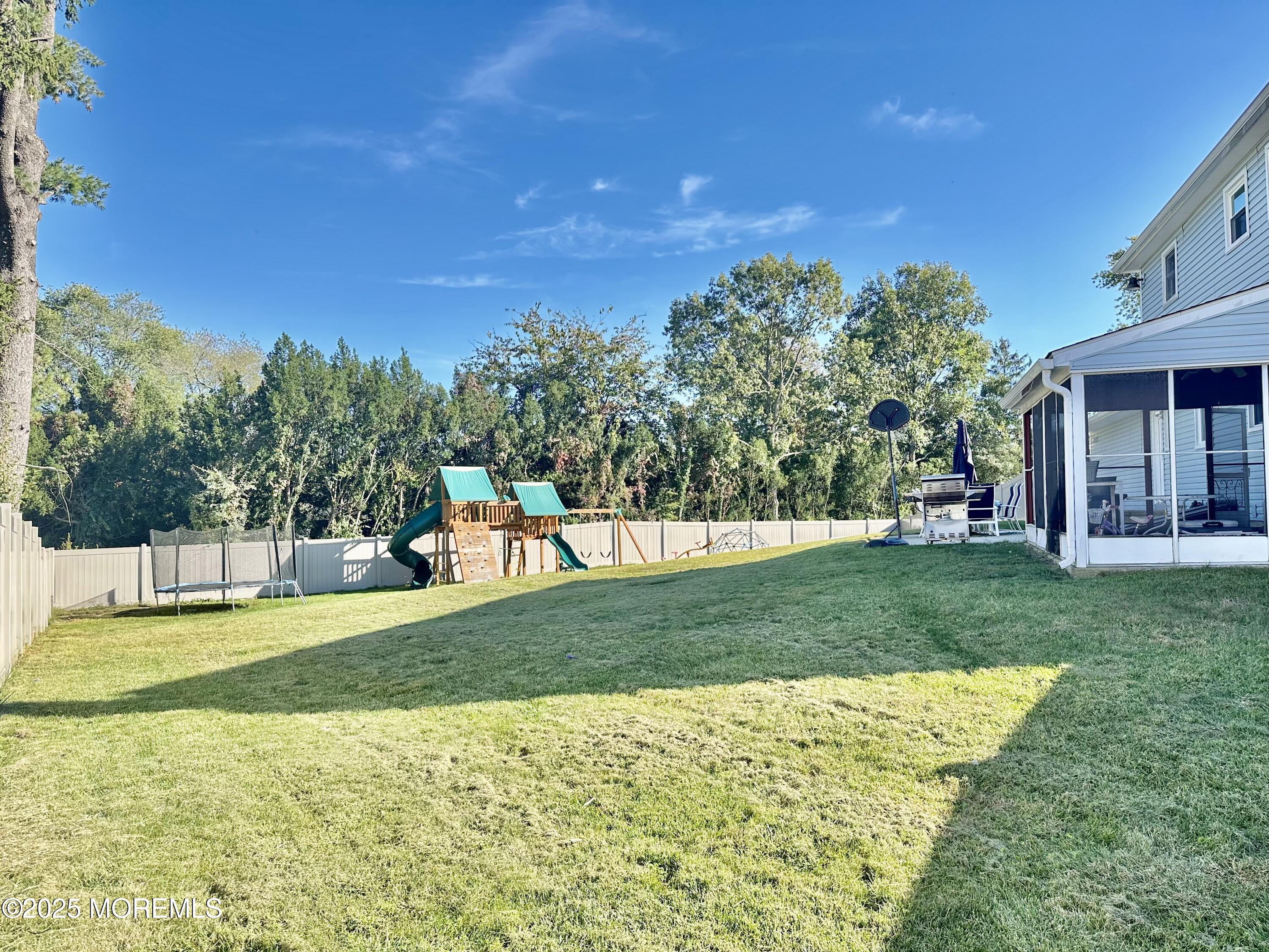 45 Springhill Drive Howell, NJ 07731 - Photo 22 of 22 a view of a house with a big yard
