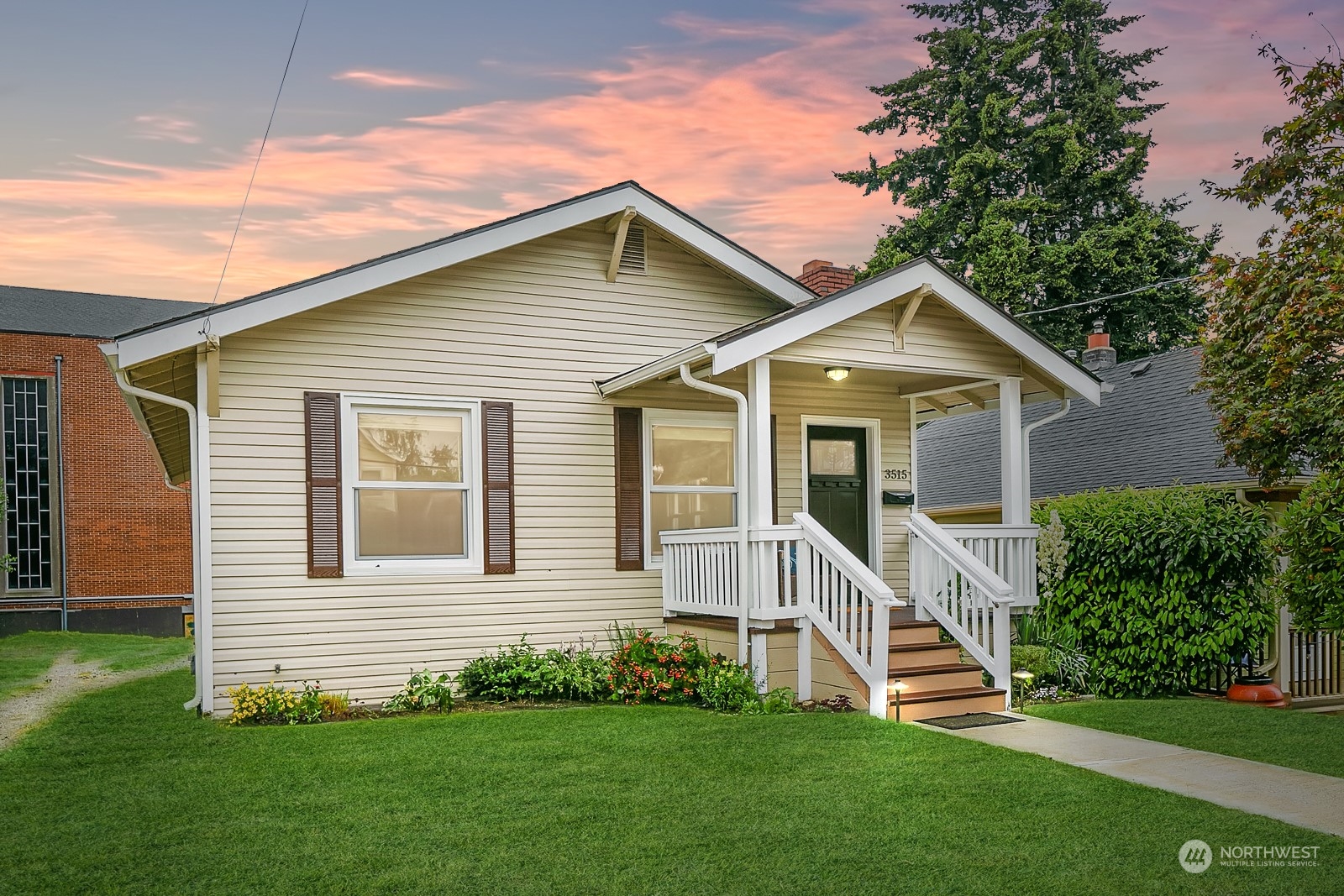 3515 Southwest Austin Street Seattle, WA 98126 - Photo 1 of 35 a view of a house with a yard