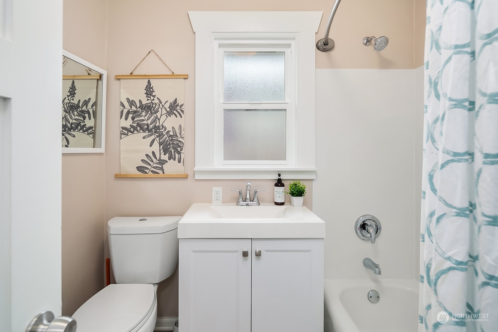 3515 Southwest Austin Street Seattle, WA 98126 - Photo 16 of 35 a bathroom with a sink mirror vanity and toilet