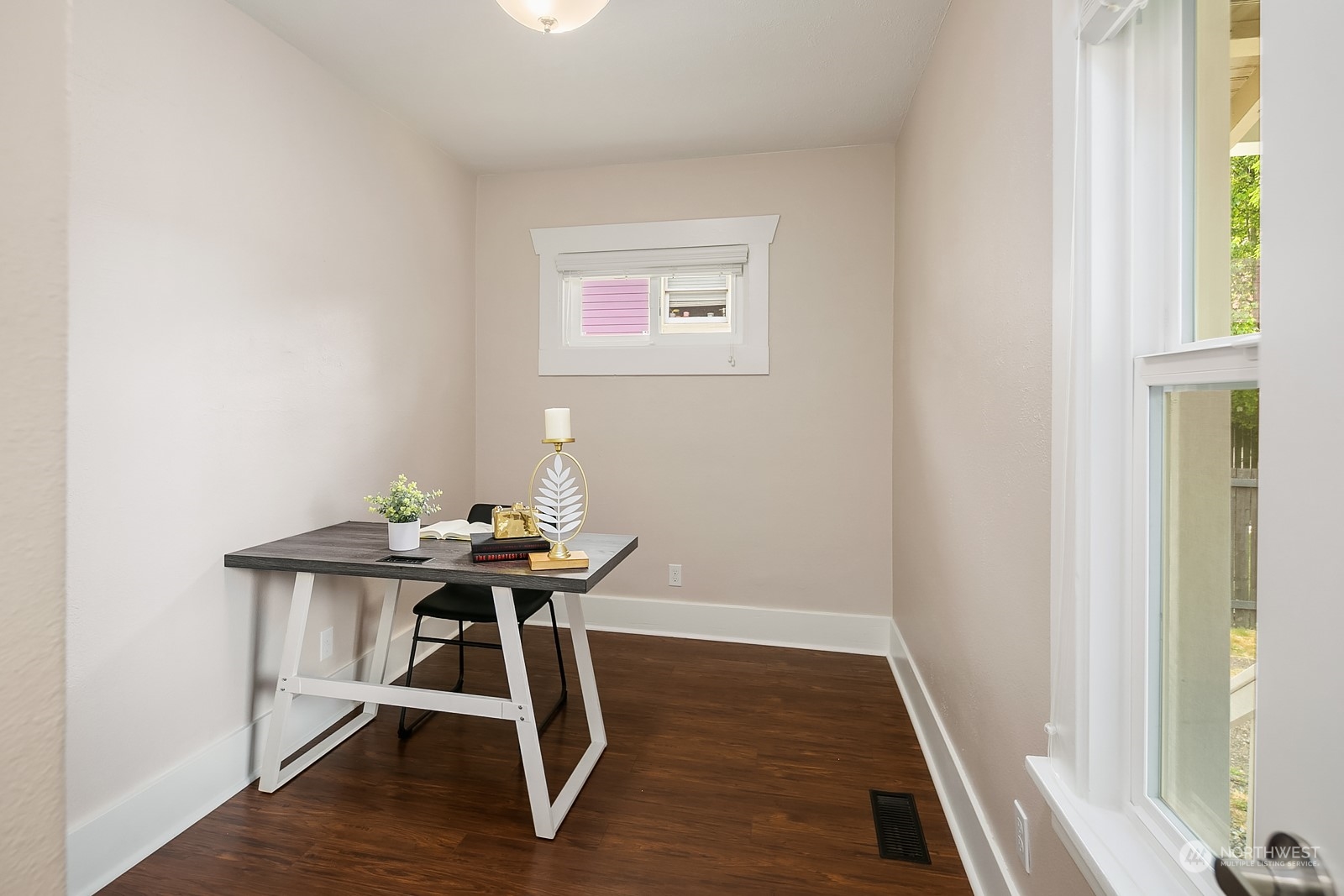 3515 Southwest Austin Street Seattle, WA 98126 - Photo 17 of 35 a view of a workspace with furniture and wooden floor