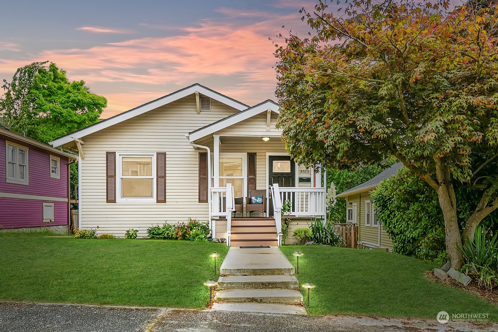 3515 Southwest Austin Street Seattle, WA 98126 - Photo 2 of 35 a front view of a house with garden