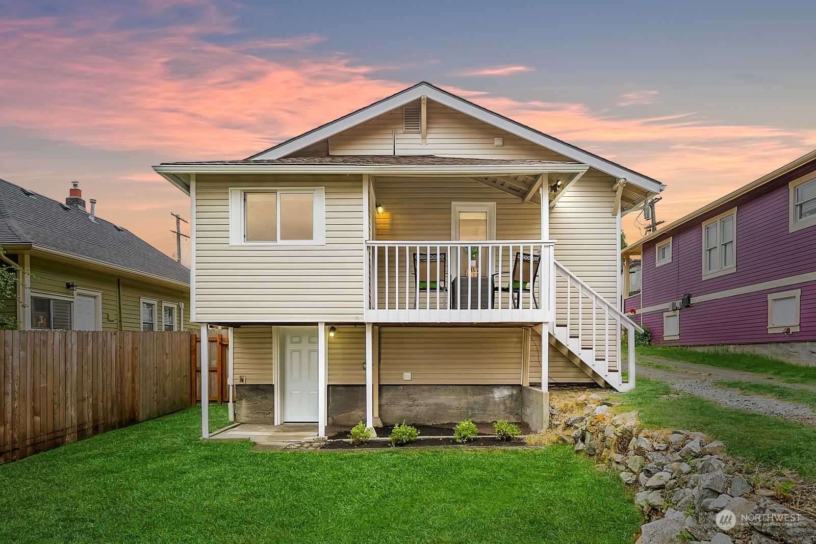 3515 Southwest Austin Street Seattle, WA 98126 - Photo 28 of 35 a front view of a house with a yard and porch