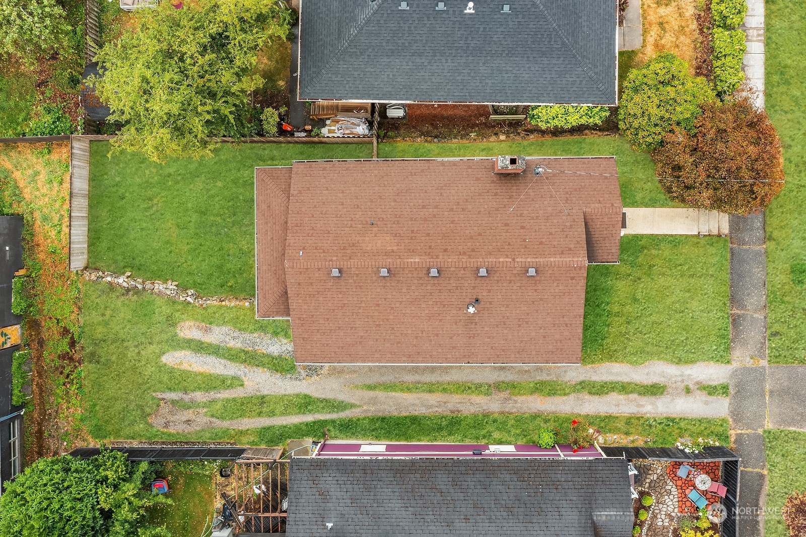 3515 Southwest Austin Street Seattle, WA 98126 - Photo 34 of 35 an aerial view of a house with a yard and lake view