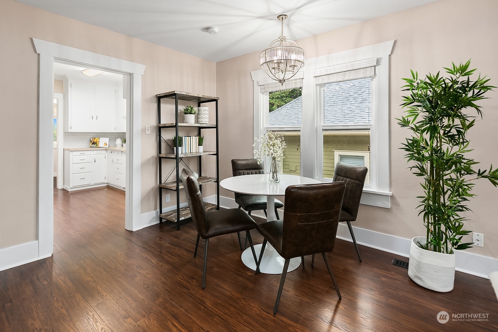 3515 Southwest Austin Street Seattle, WA 98126 - Photo 8 of 35 a dining room with furniture potted plants and wooden floor