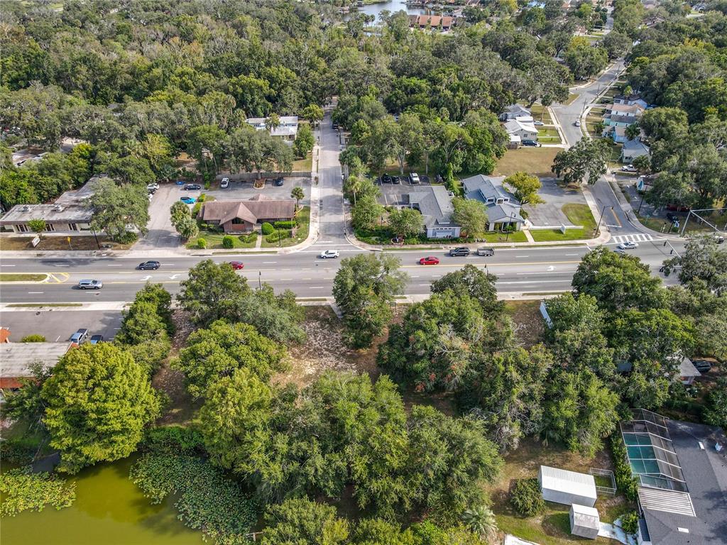 1024 West Dixie Avenue Leesburg, FL 34748 - Photo 17 of 23 an aerial view of residential houses with outdoor space and swimming pool