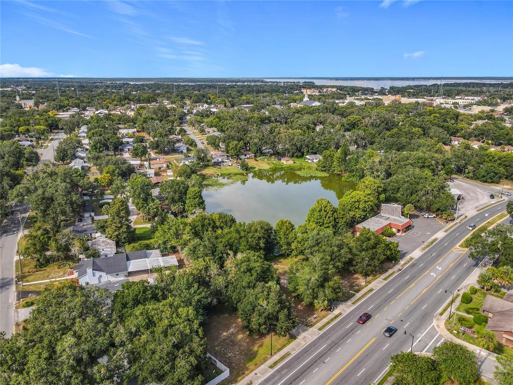 1024 West Dixie Avenue Leesburg, FL 34748 - Photo 10 of 23 an aerial view of residential houses with outdoor space and river