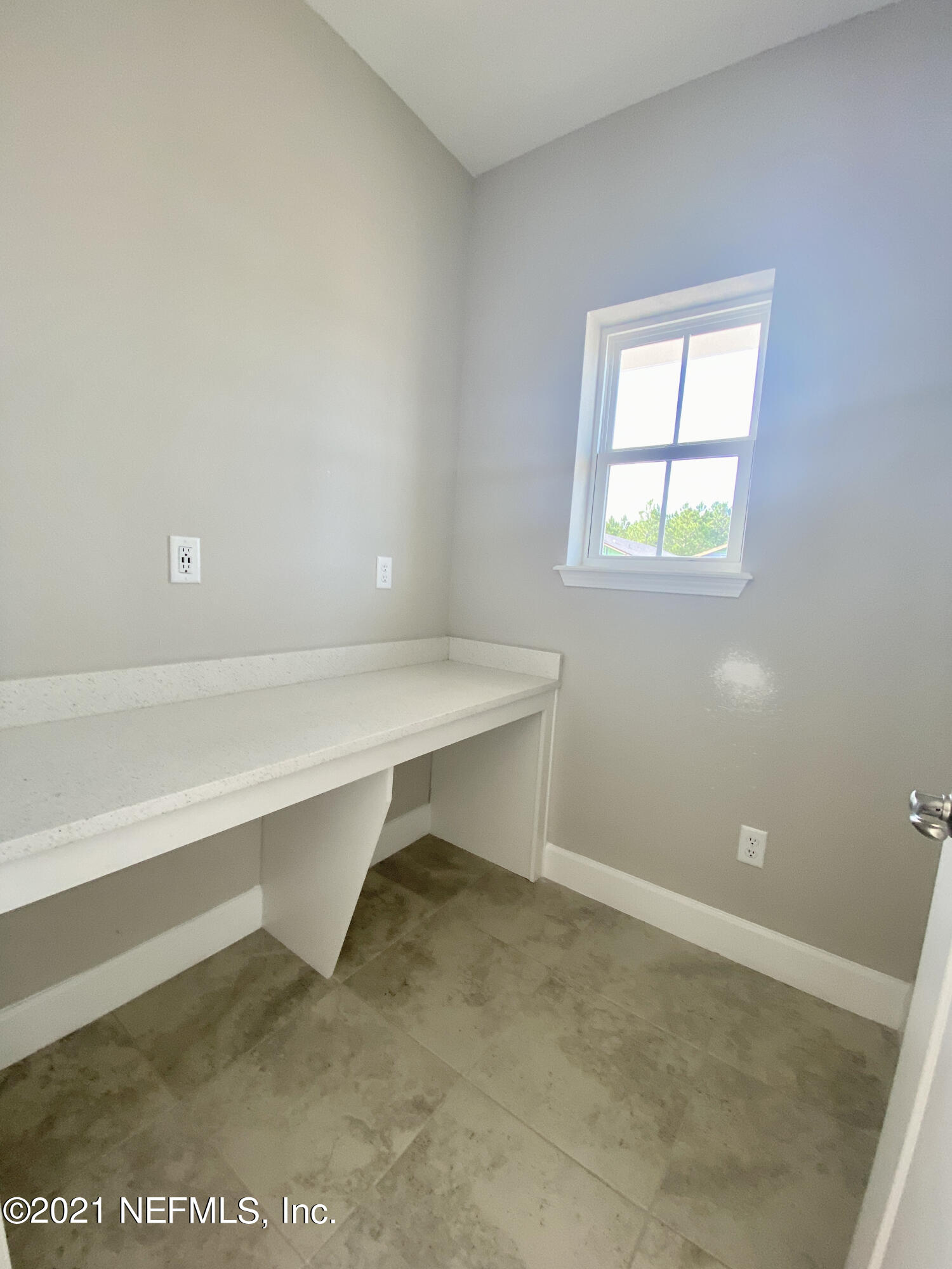 1055 Rustic Mill Dr Street St. Augustine, FL 32092 - Photo 3 of 39 a view of an empty room with a window