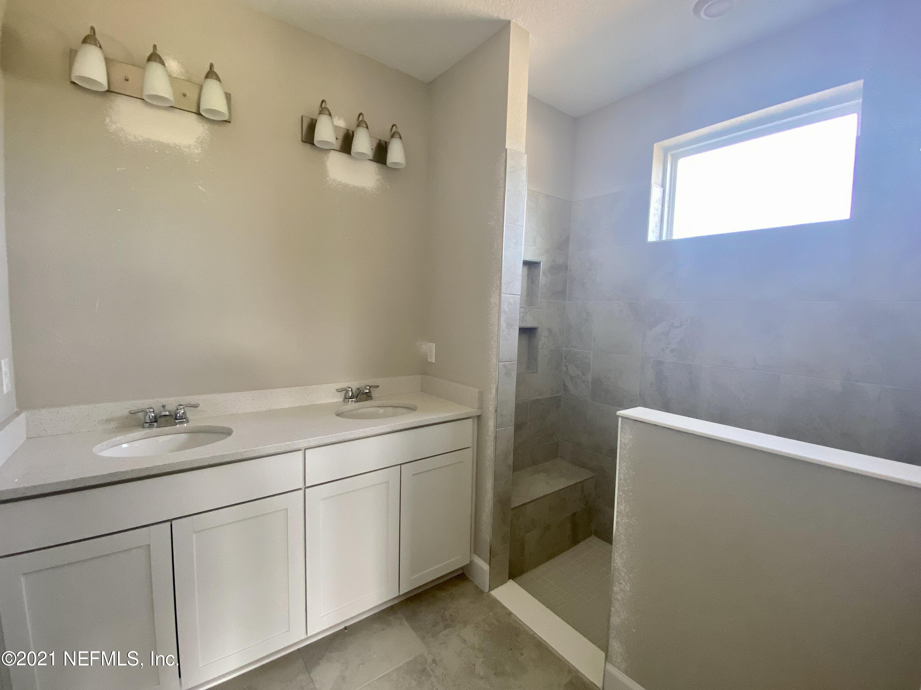1055 Rustic Mill Dr Street St. Augustine, FL 32092 - Photo 5 of 39 a utility room with a sink dryer and washer