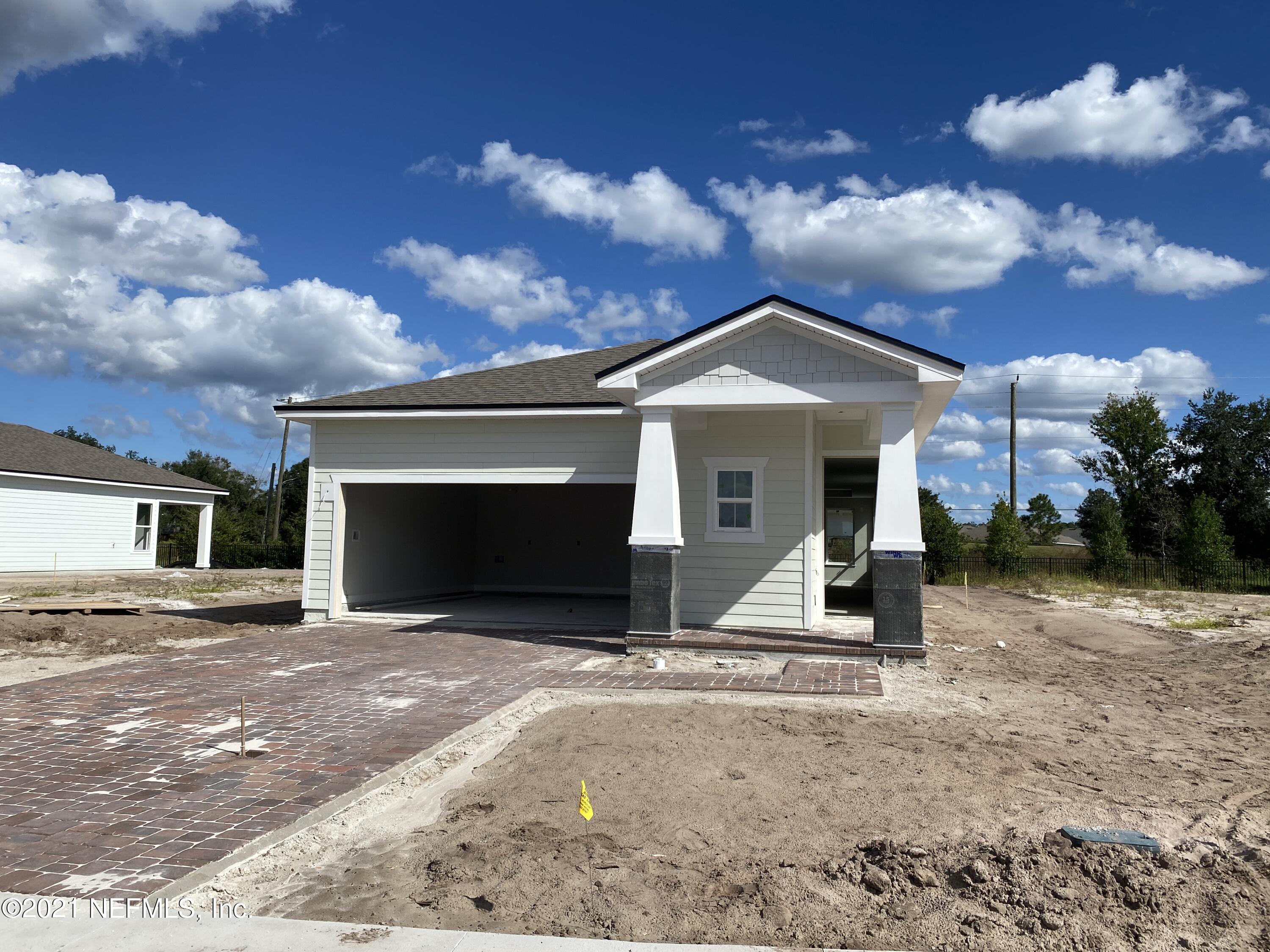 1055 Rustic Mill Dr Street St. Augustine, FL 32092 - Photo 9 of 39 a view of a house with a patio