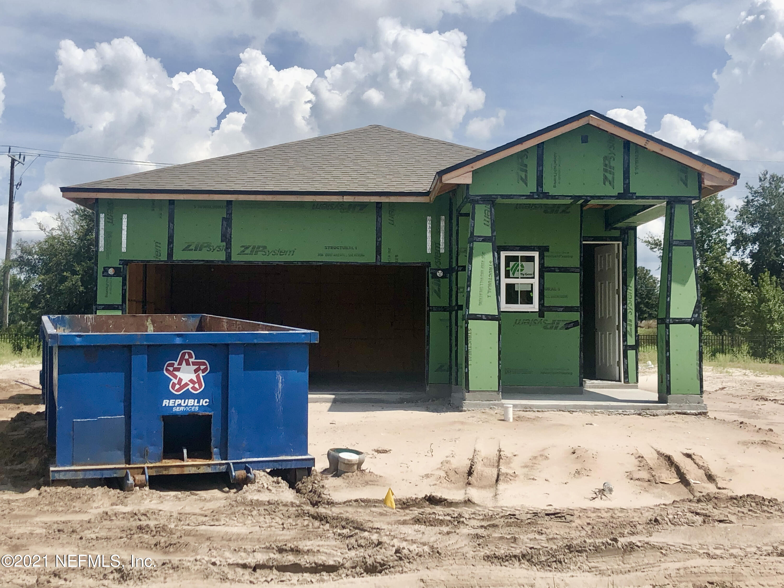 1055 Rustic Mill Dr Street St. Augustine, FL 32092 - Photo 10 of 39 a front view of a house with yard