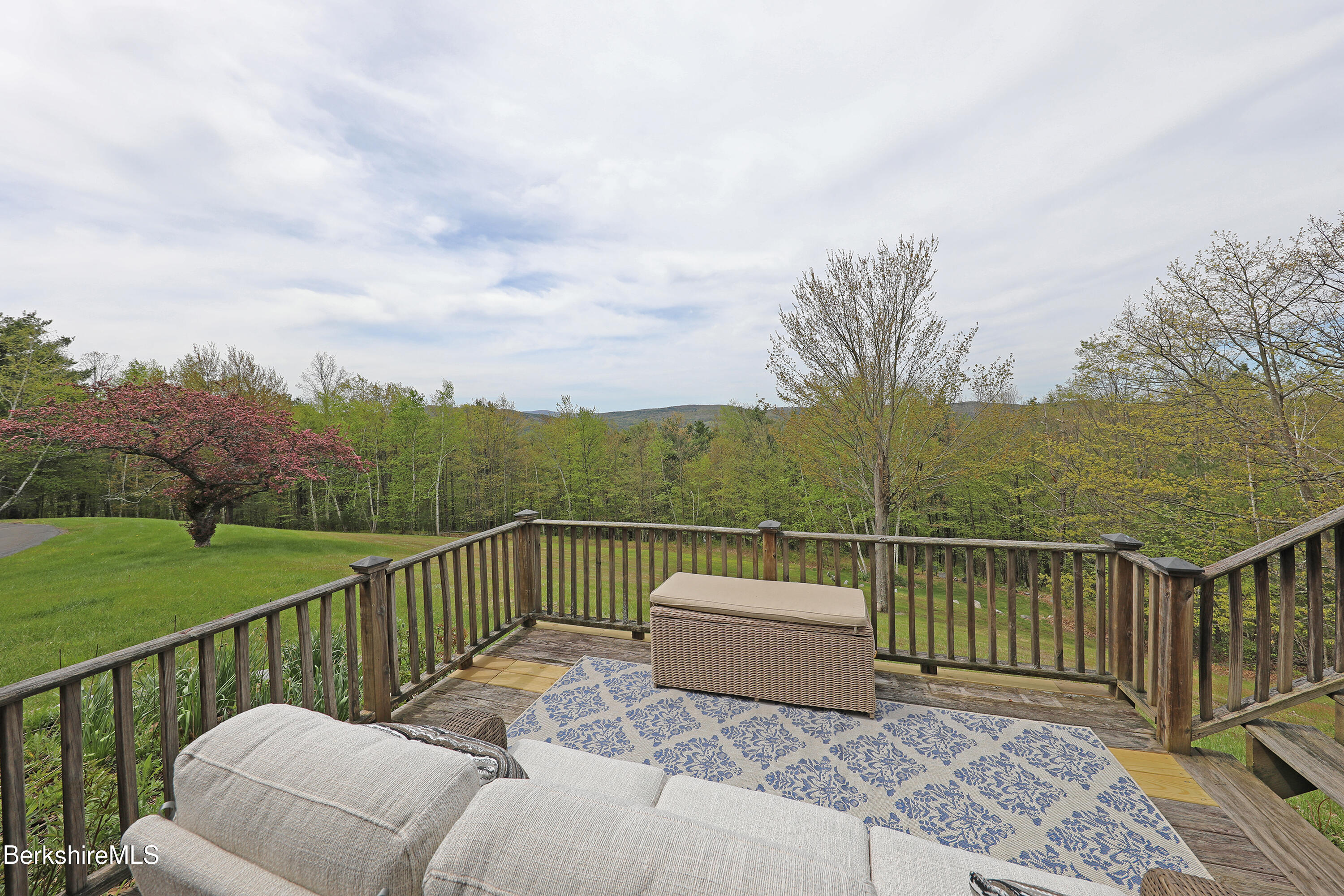 126 Temple Road New Lebanon, NY 12125 - Photo 21 of 37 a view of a roof deck with couches and wooden floor