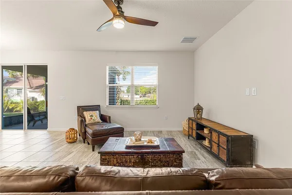 a living room with furniture and a window