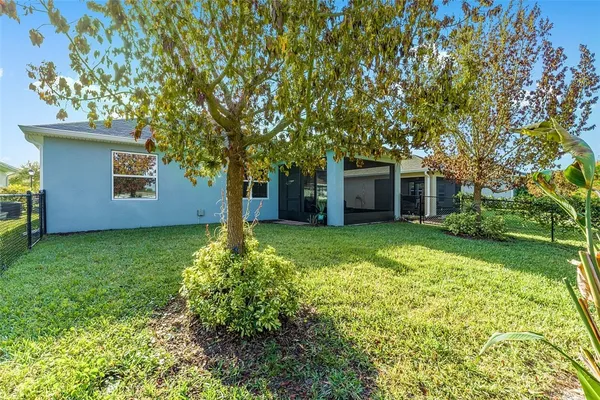 a house with trees in front of it