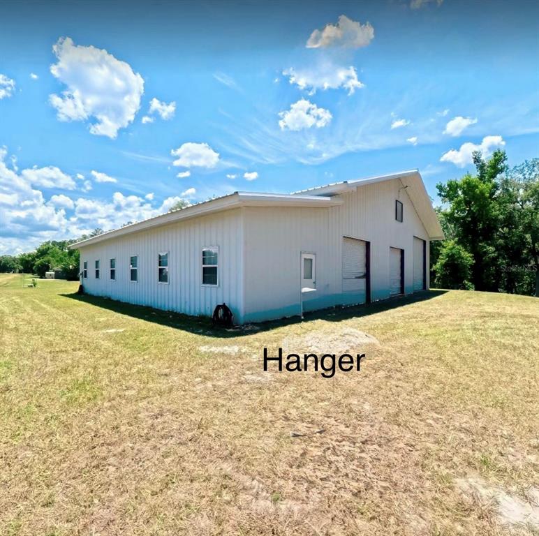 7390 South Mc Alpin Road McAlpin, FL 32062 - Photo 53 of 53 a view of a house with a yard