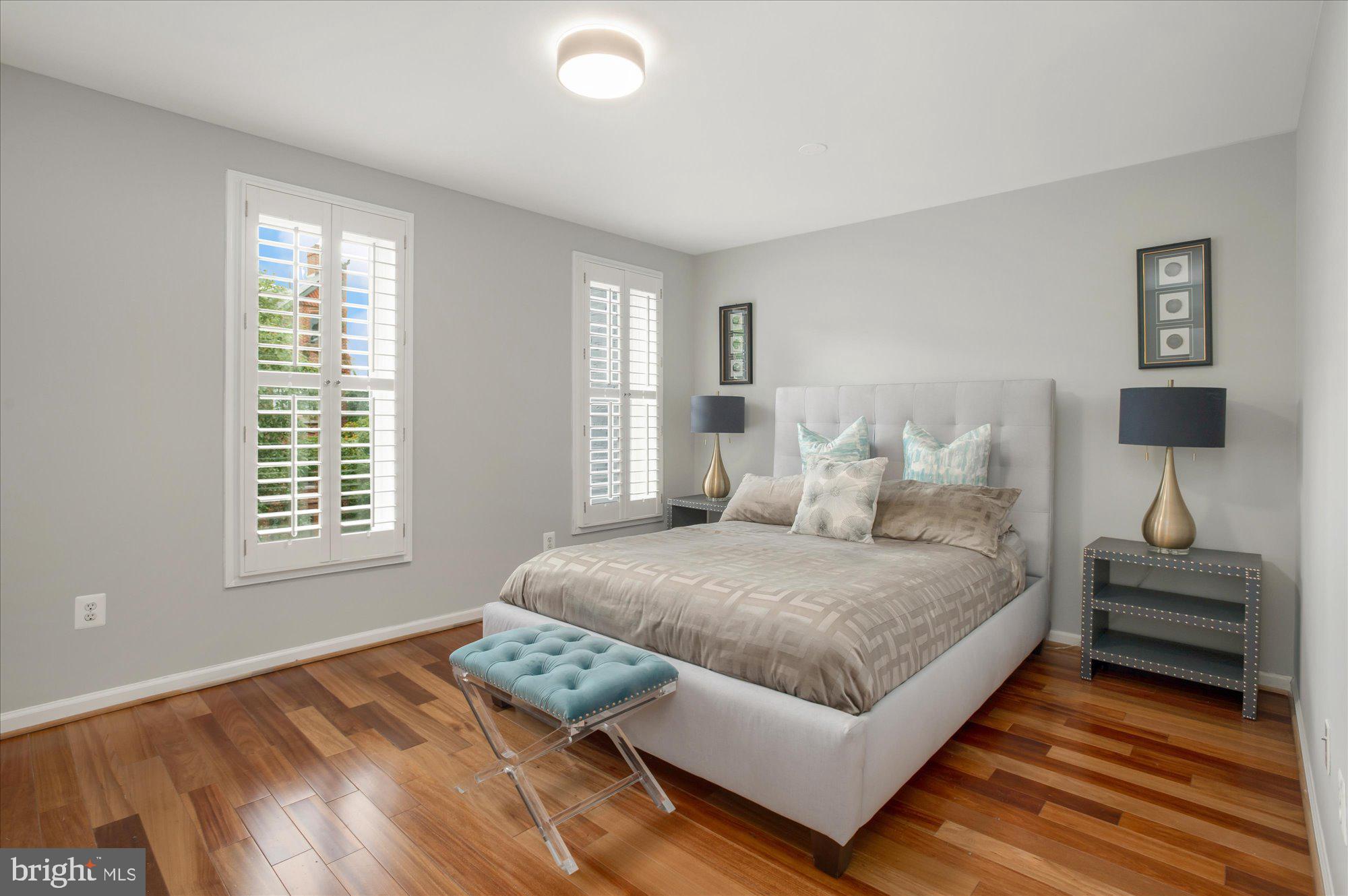 323 T Street Northwest Washington, DC 20001 - Photo 19 of 35 a bedroom with a bed and window