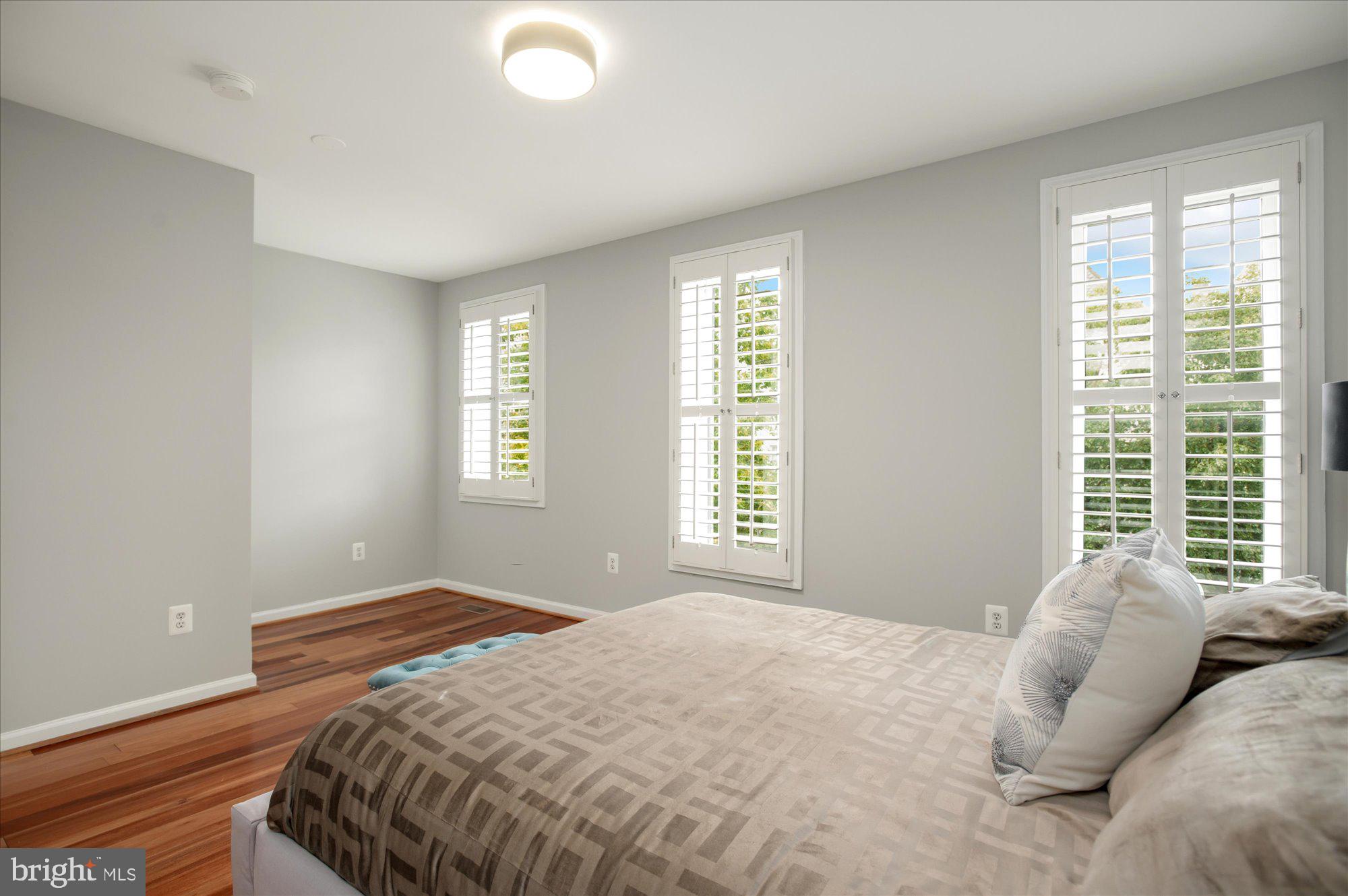 323 T Street Northwest Washington, DC 20001 - Photo 21 of 35 a bedroom with a bed and a window