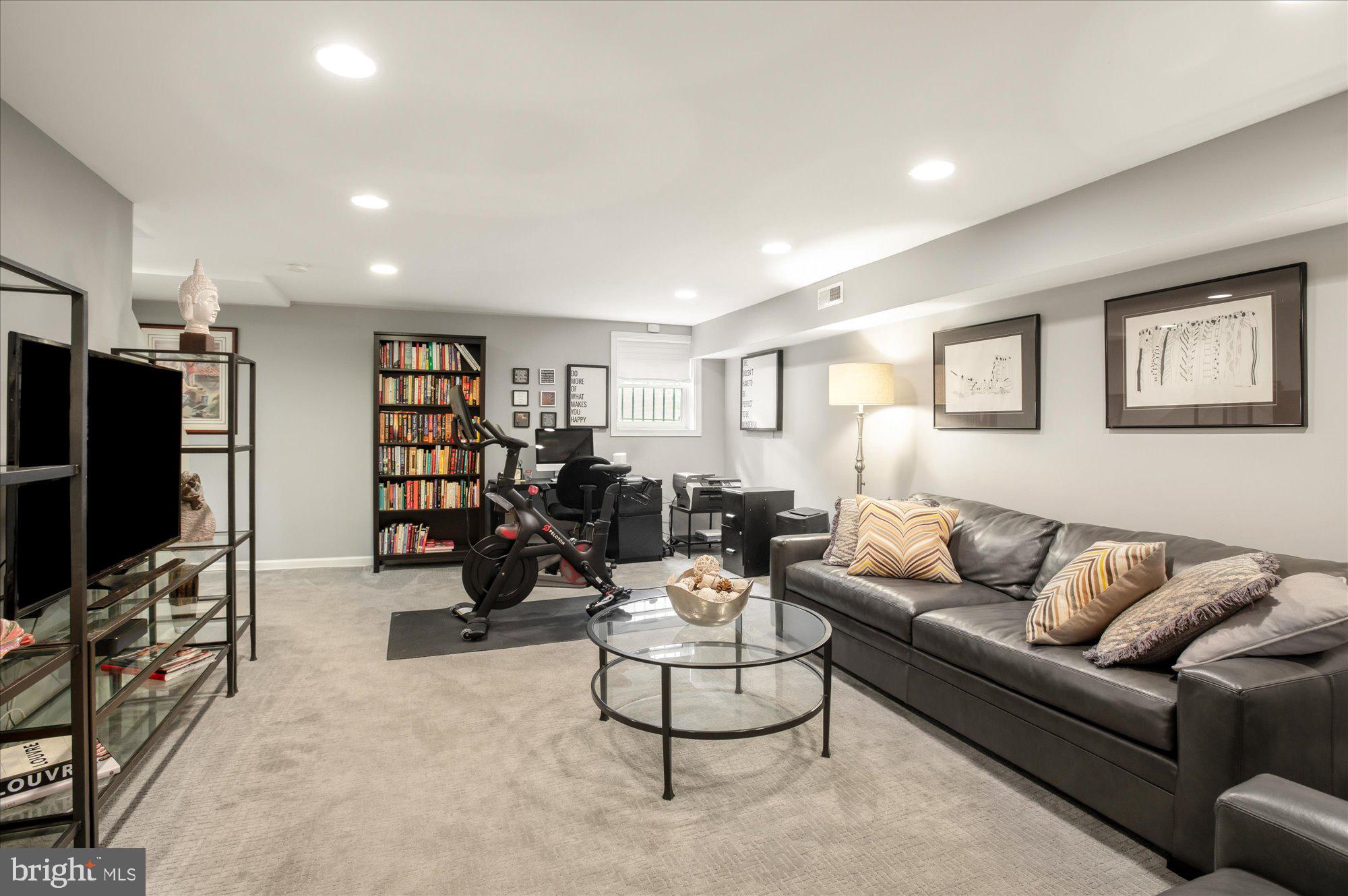 323 T Street Northwest Washington, DC 20001 - Photo 24 of 35 a living room with furniture a couch and a flat screen tv