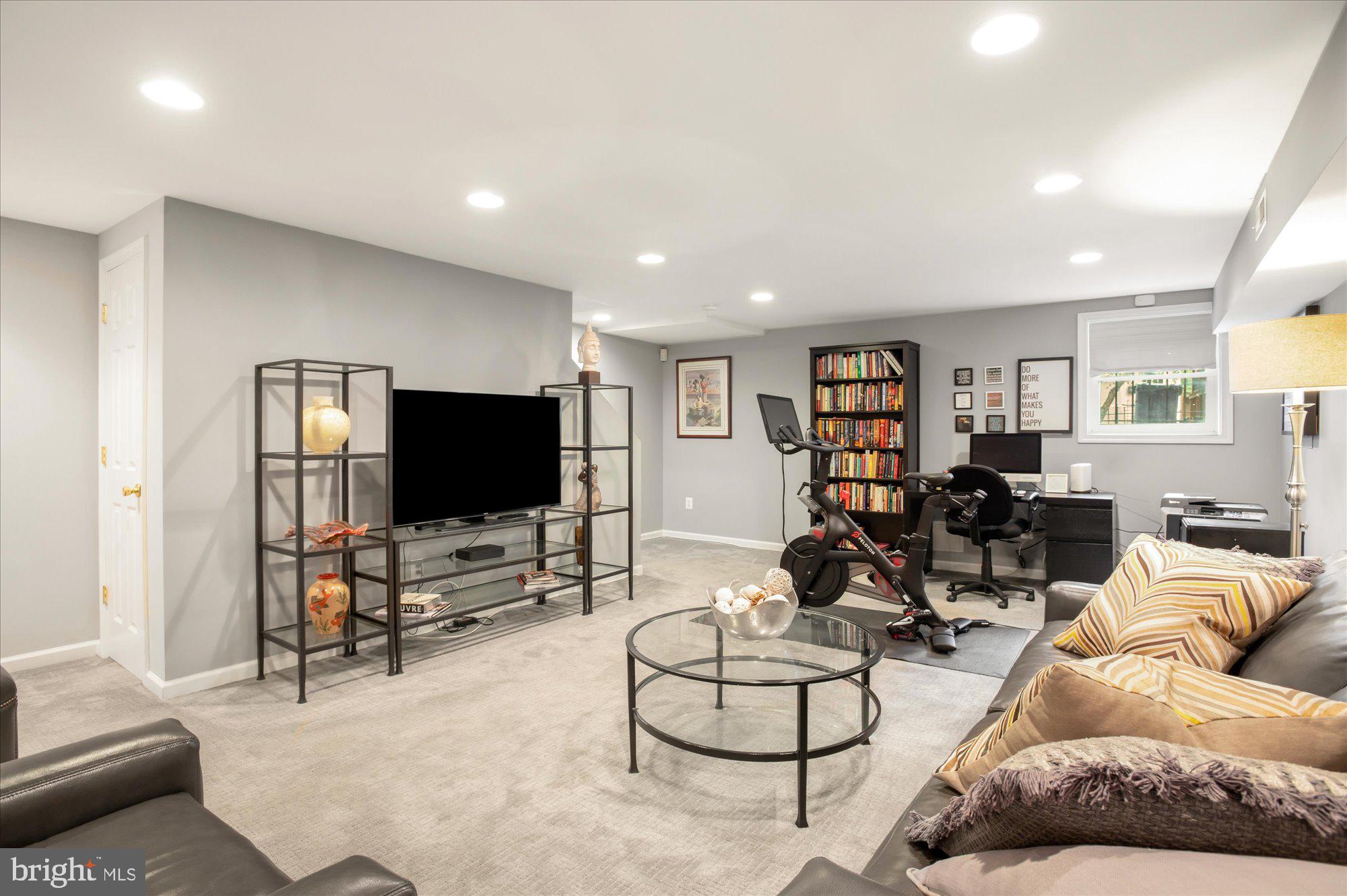 323 T Street Northwest Washington, DC 20001 - Photo 26 of 35 a living room with furniture and a flat screen tv