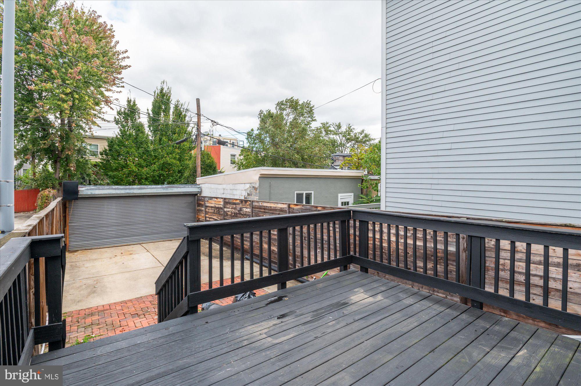 323 T Street Northwest Washington, DC 20001 - Photo 29 of 35 a view of deck with wooden floor and fence