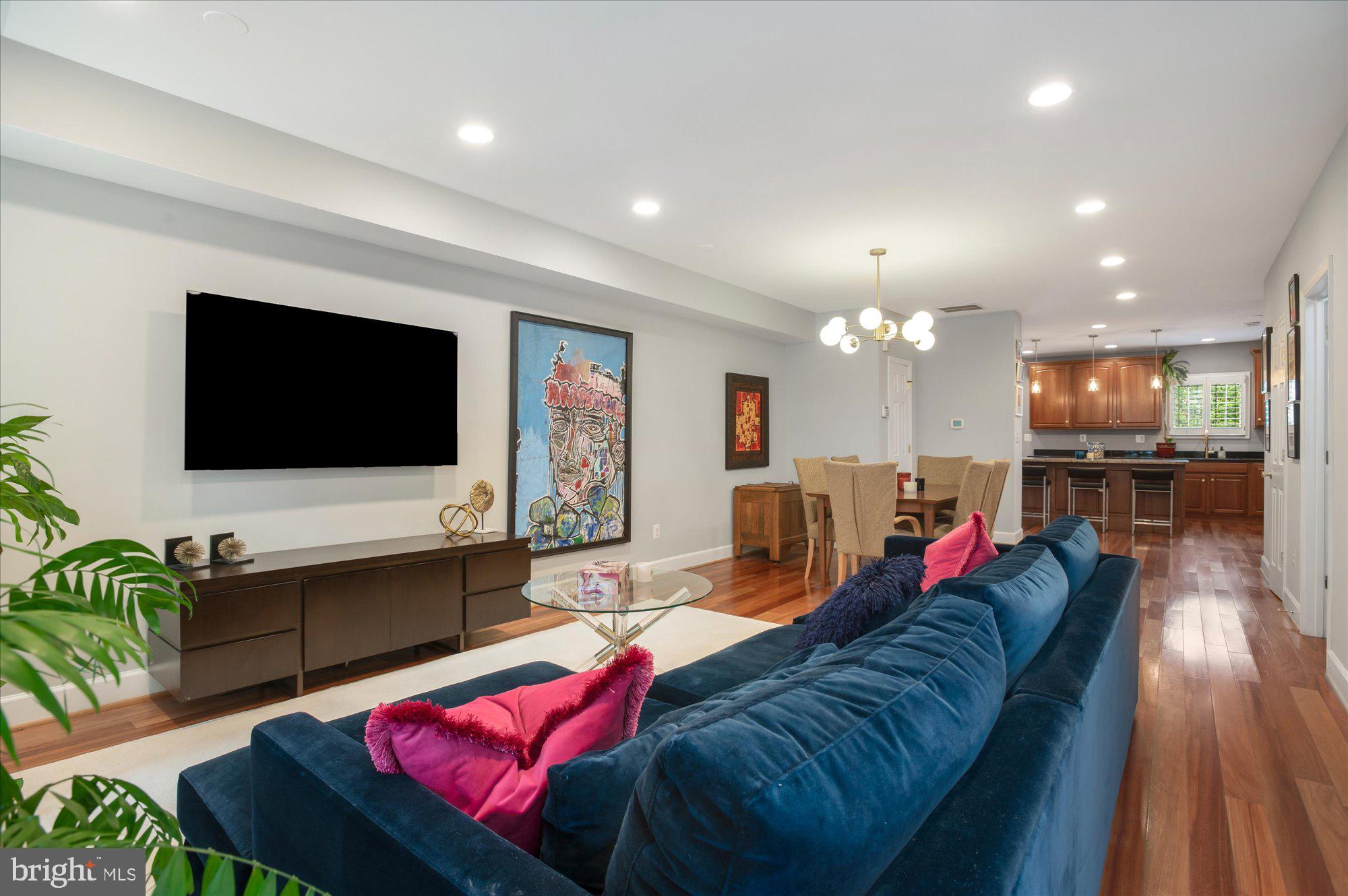 323 T Street Northwest Washington, DC 20001 - Photo 3 of 35 a living room with furniture and a flat screen tv