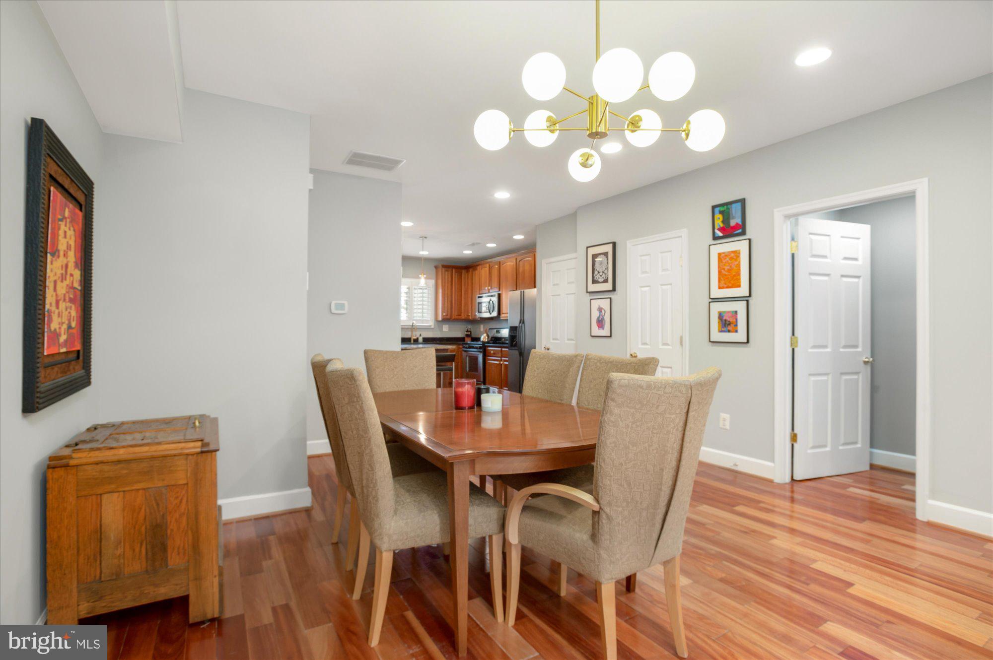 323 T Street Northwest Washington, DC 20001 - Photo 5 of 35 a view of a dining room with furniture and wooden floor