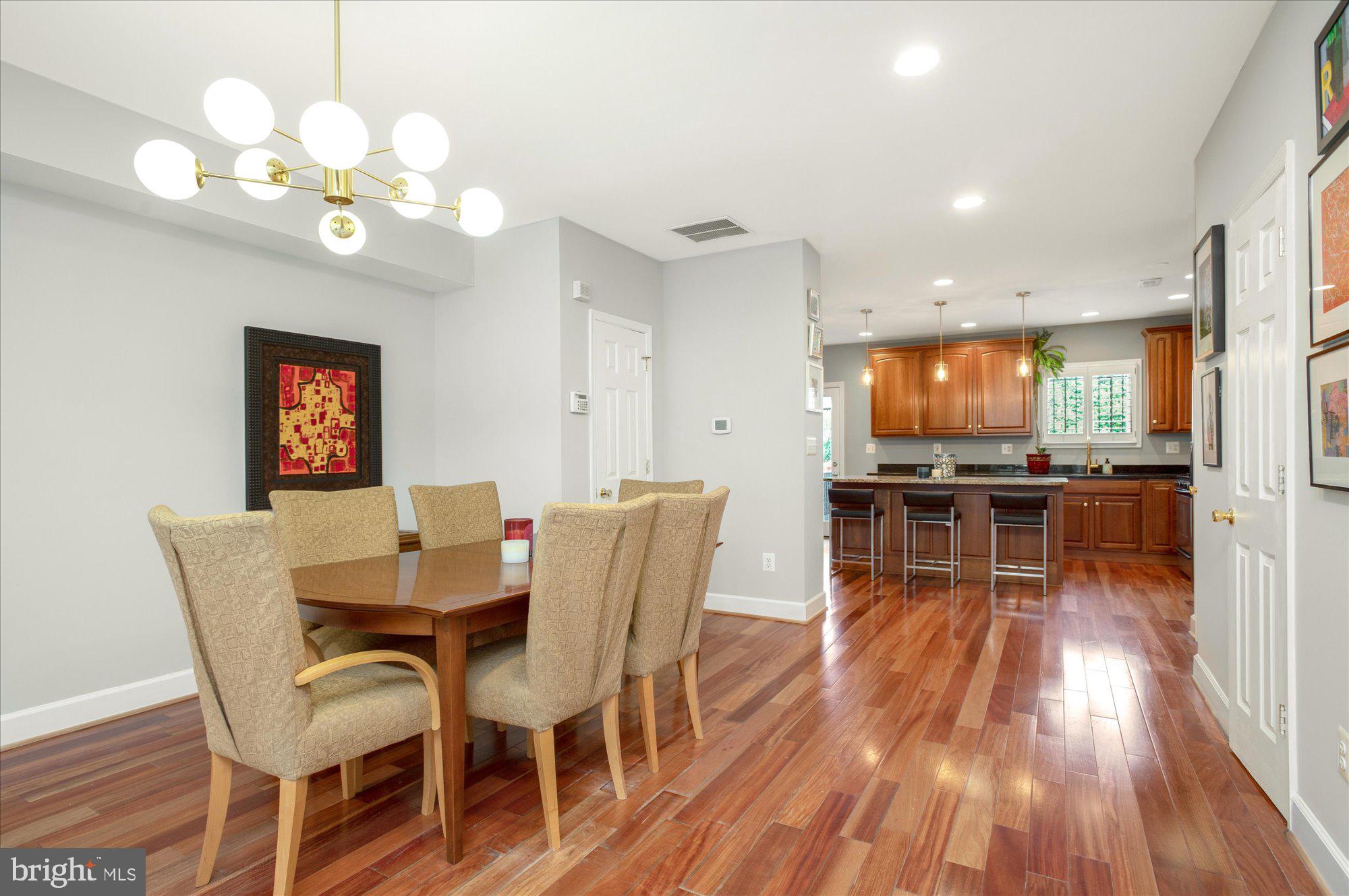 323 T Street Northwest Washington, DC 20001 - Photo 6 of 35 a view of a dining room with furniture and wooden floor