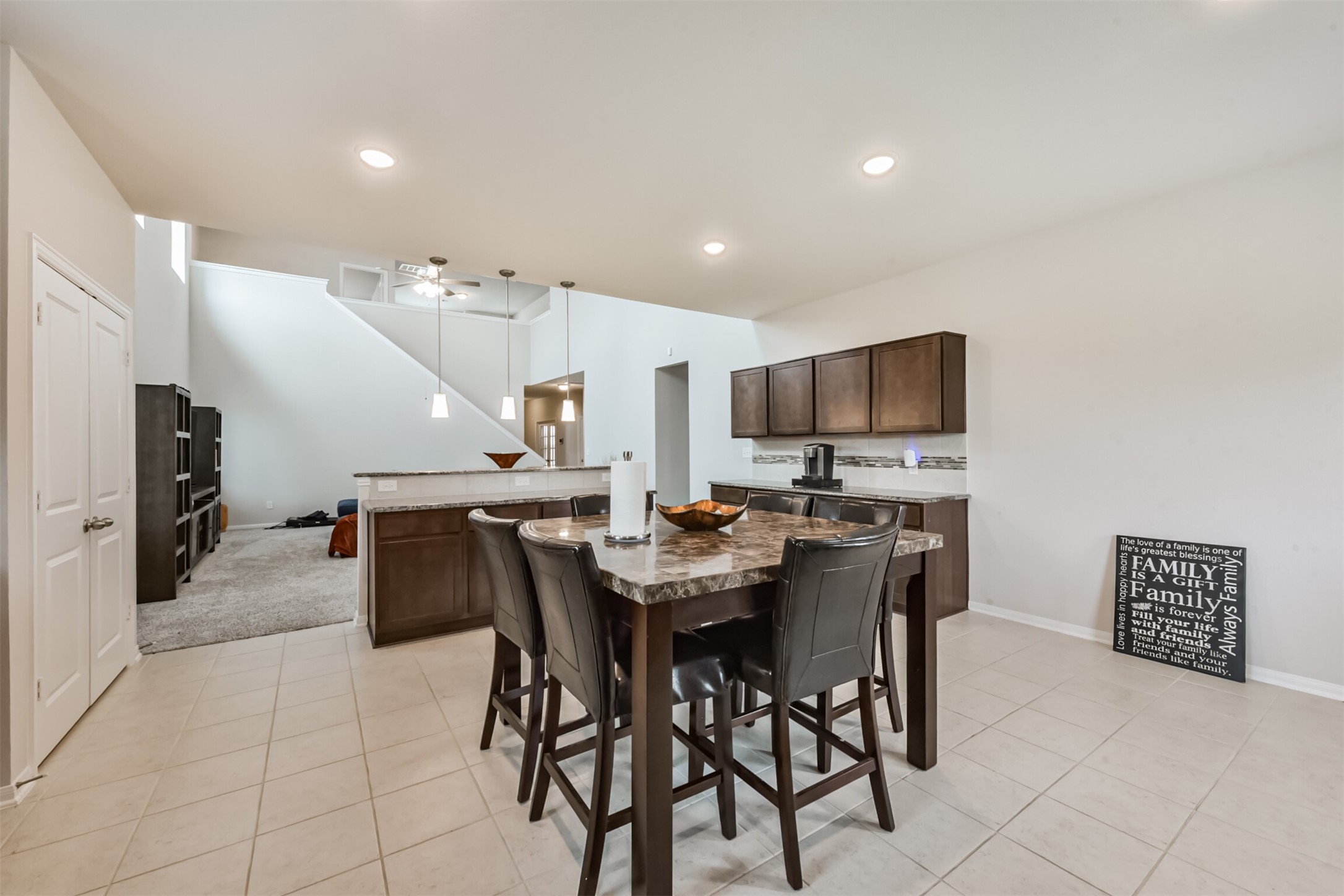 3607 Crosspointe Pass Angleton, TX 77515 - Photo 16 of 46 a view of a dining room with furniture