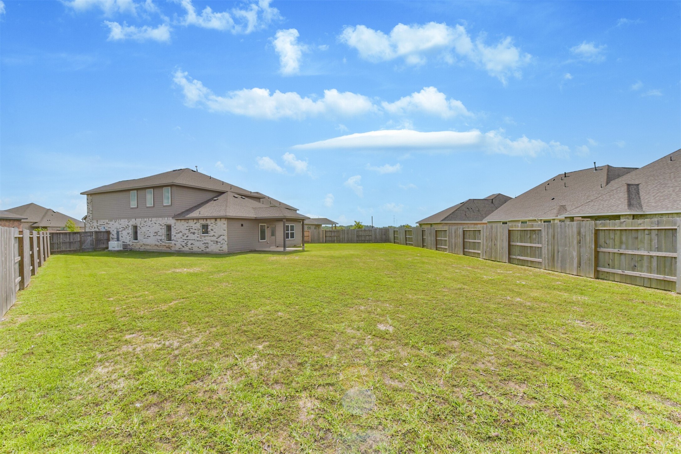 3607 Crosspointe Pass Angleton, TX 77515 - Photo 39 of 46 a view of an ocean house with a yard