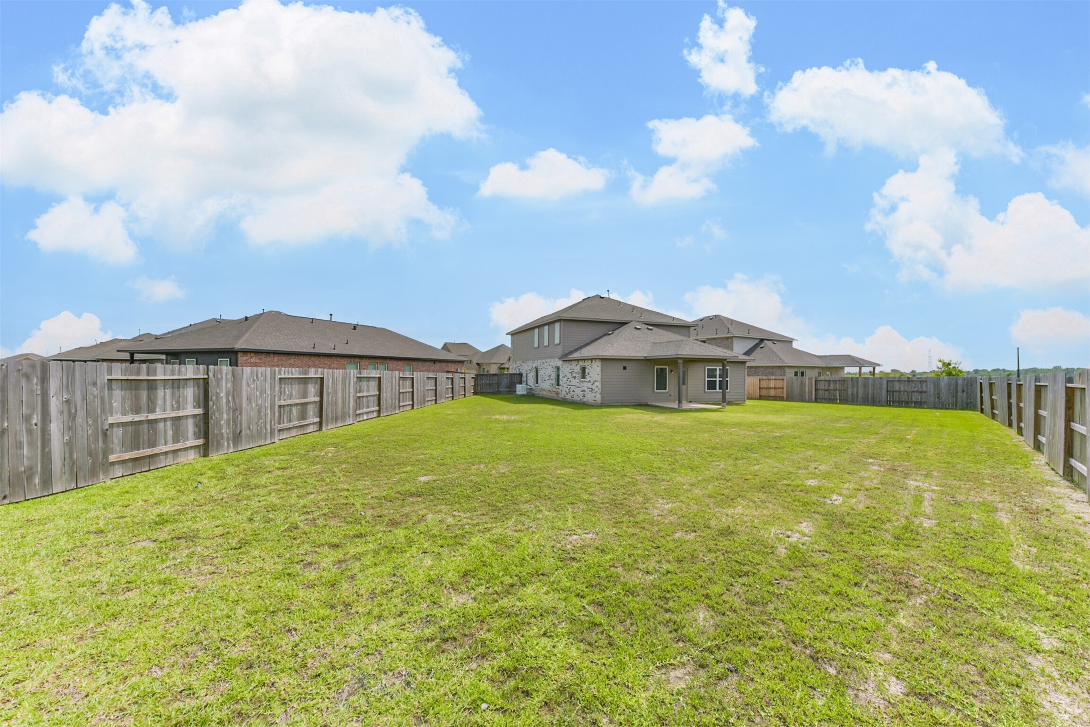 3607 Crosspointe Pass Angleton, TX 77515 - Photo 40 of 46 a view of a house with pool and a yard
