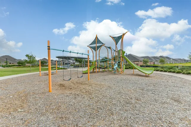 a view of a lake with a big yard