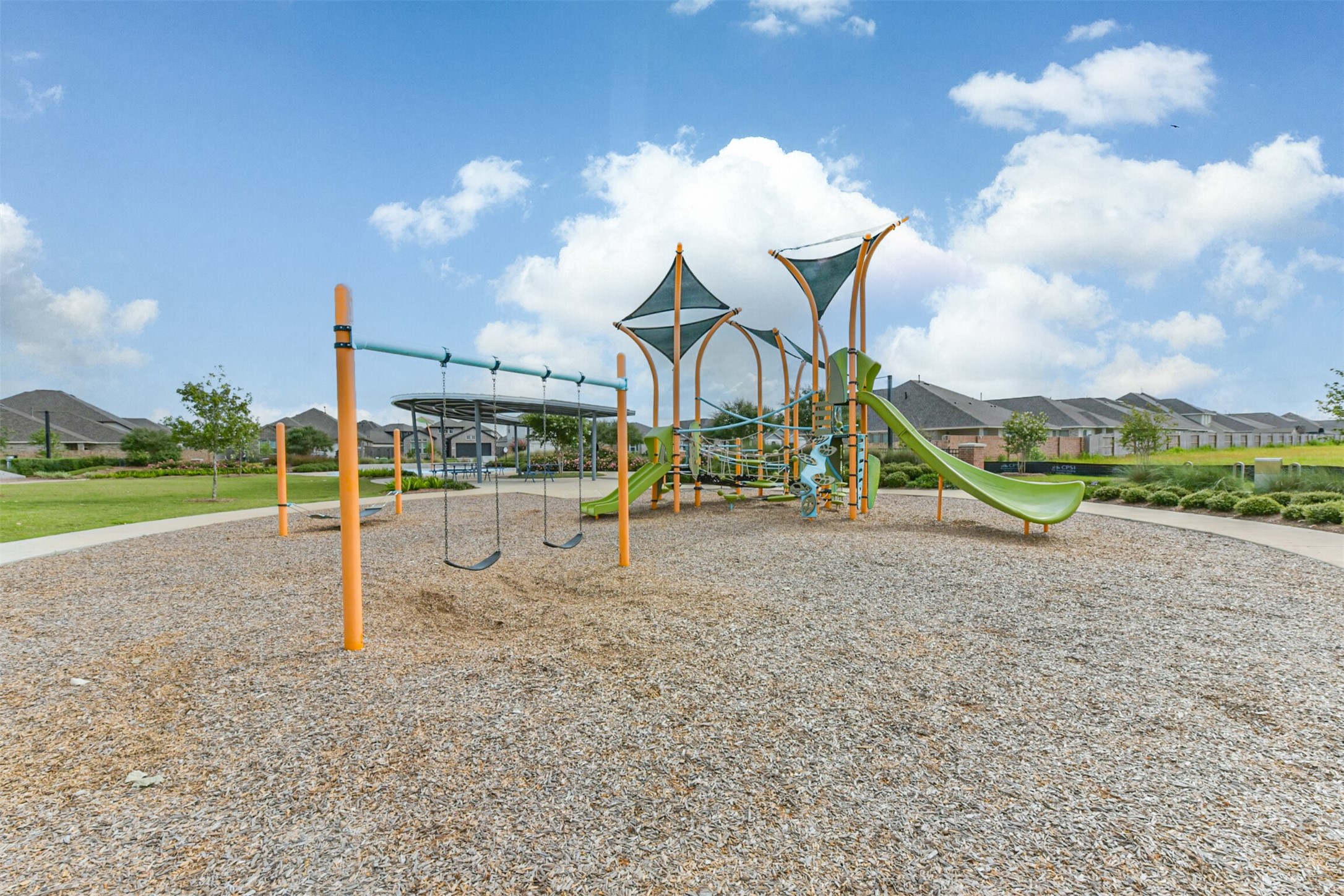 3607 Crosspointe Pass Angleton, TX 77515 - Photo 44 of 46 a view of a park with swings
