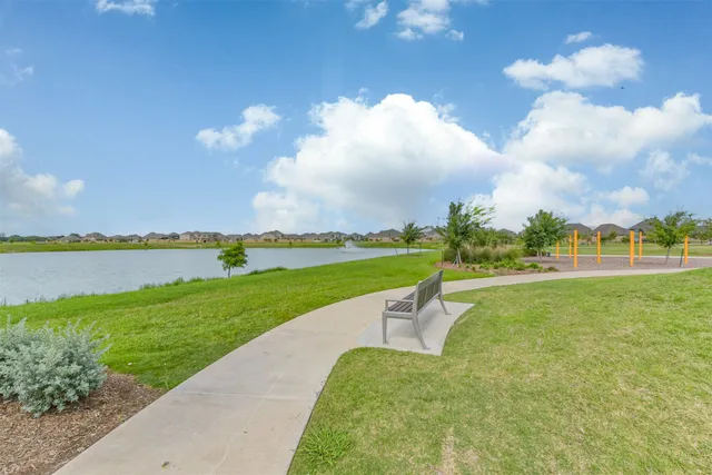 a view of a lake with a big yard