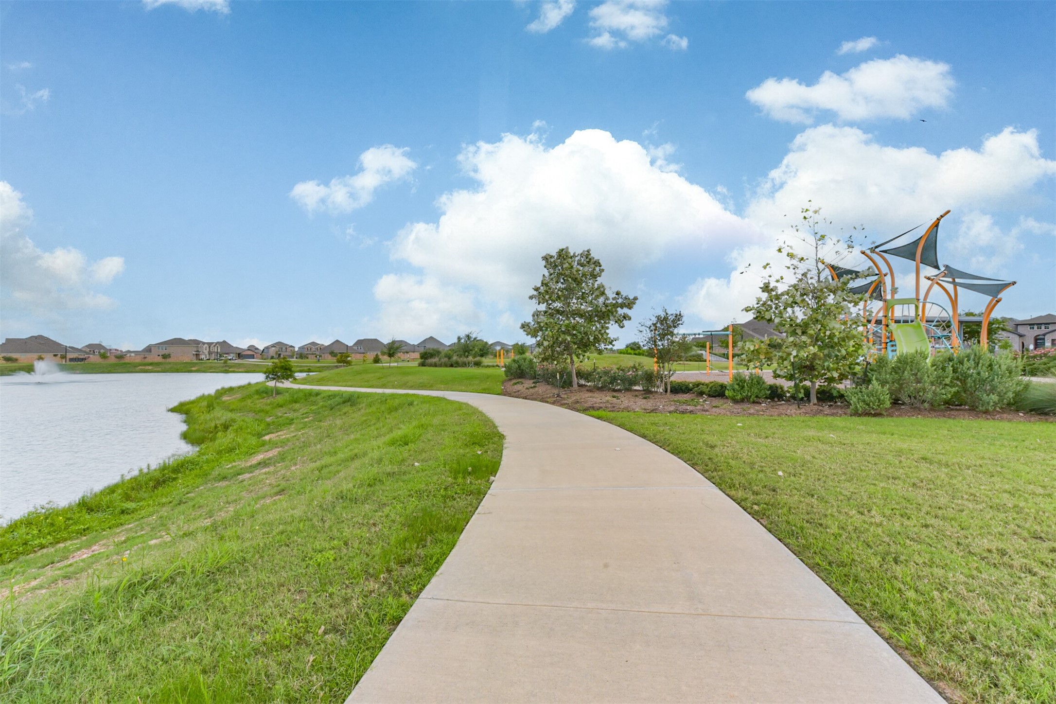 3607 Crosspointe Pass Angleton, TX 77515 - Photo 46 of 46 a view of a lake with a big yard