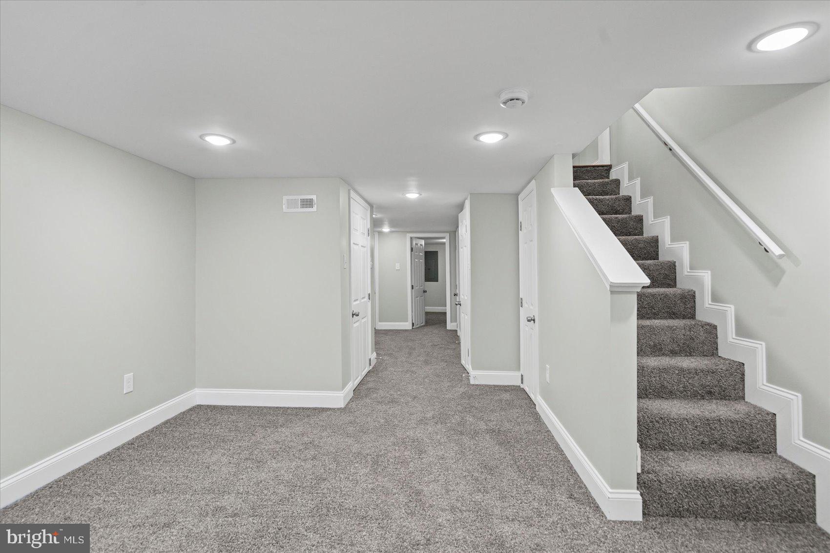 3814 Flowerton Road Baltimore, MD 21229 - Photo 15 of 42 a view of a hallway with staircase