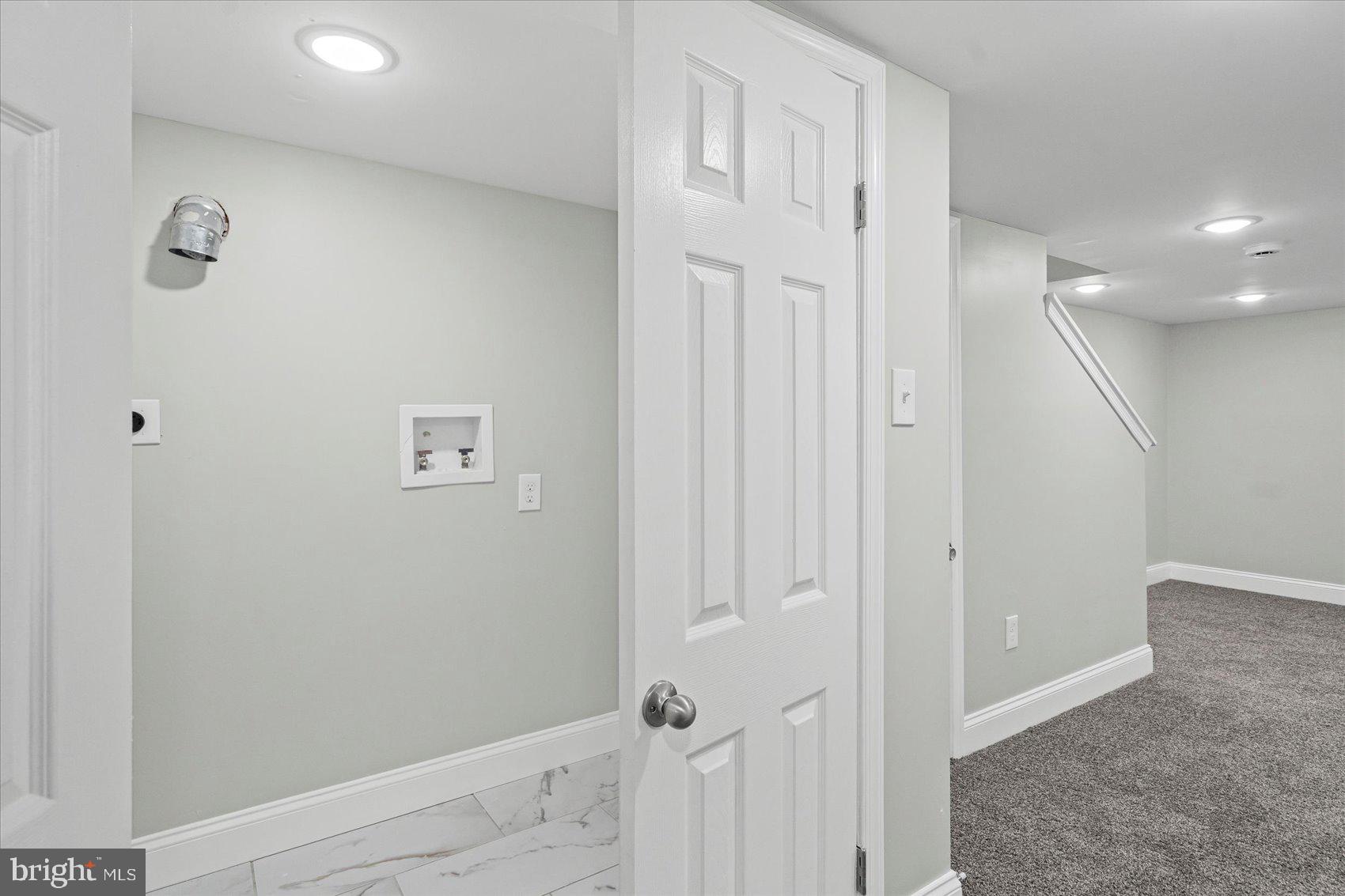 3814 Flowerton Road Baltimore, MD 21229 - Photo 17 of 42 a view of a hallway with closet area