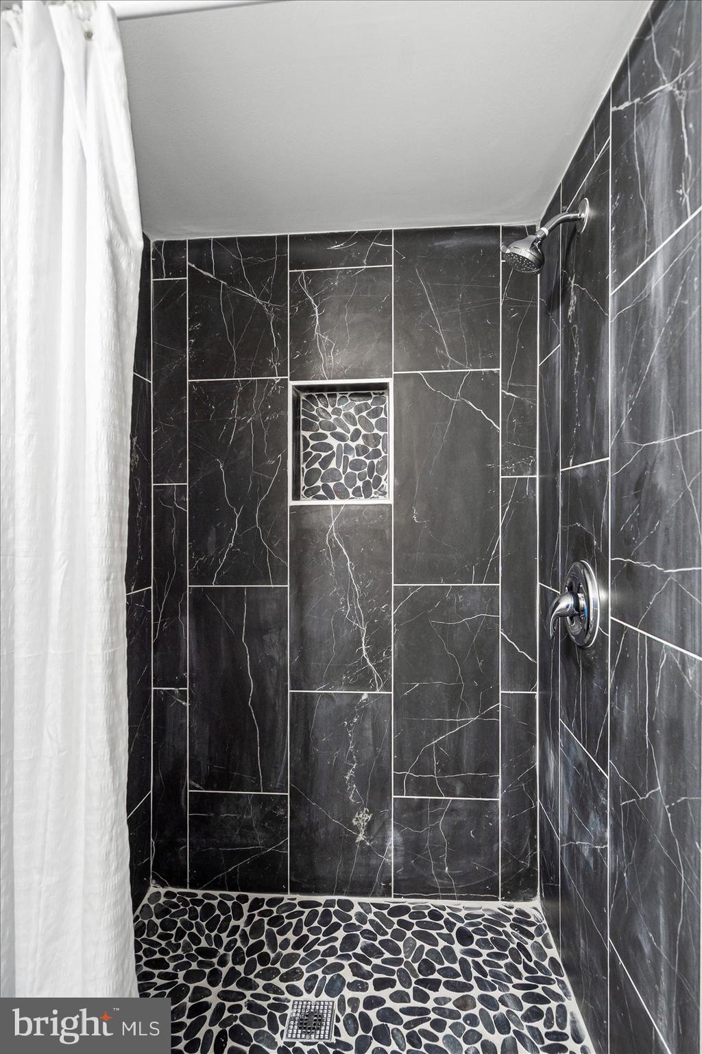 3814 Flowerton Road Baltimore, MD 21229 - Photo 19 of 42 a bathroom with a shower