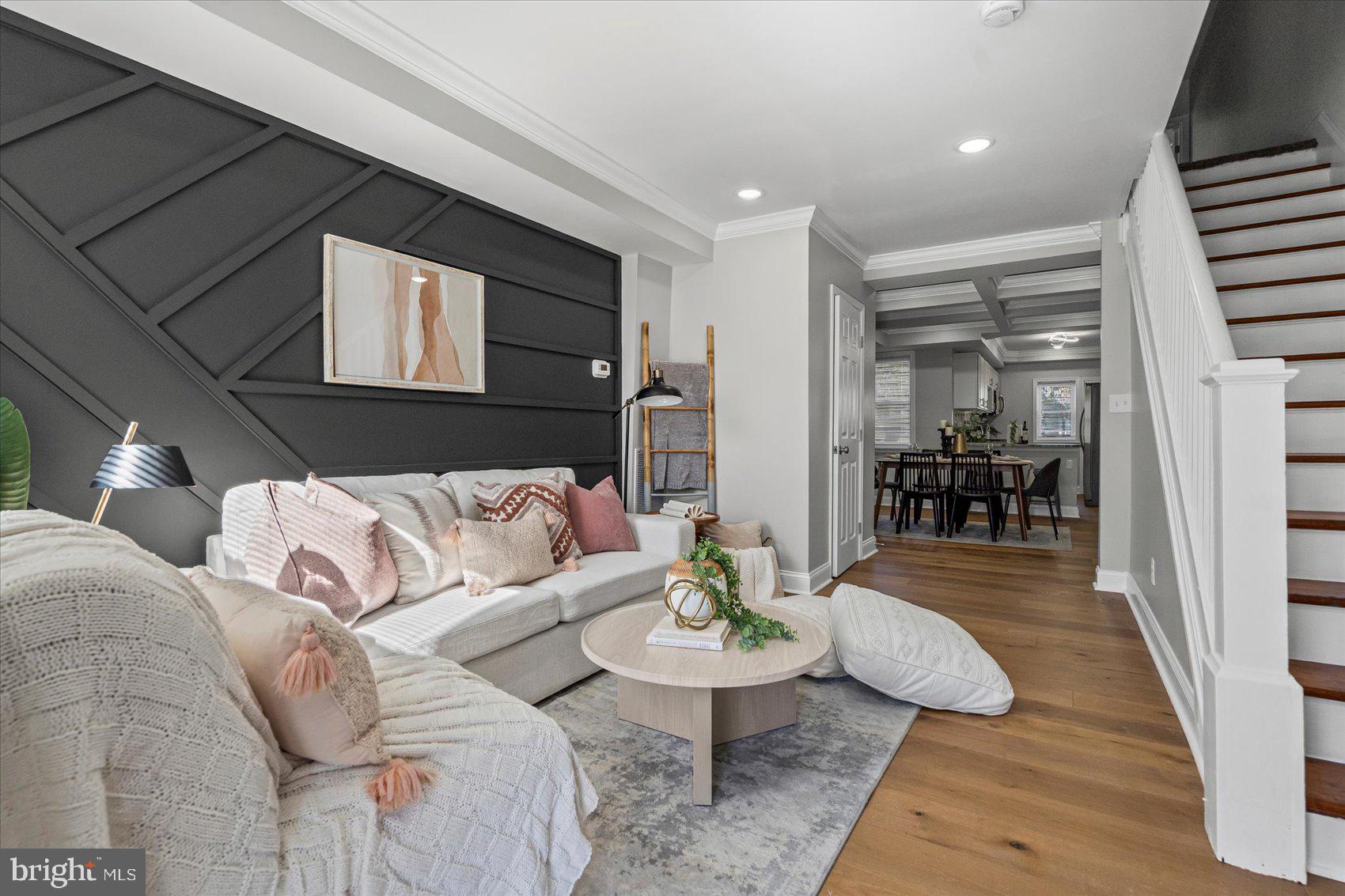 3814 Flowerton Road Baltimore, MD 21229 - Photo 2 of 42 a living room with furniture and a wooden floor