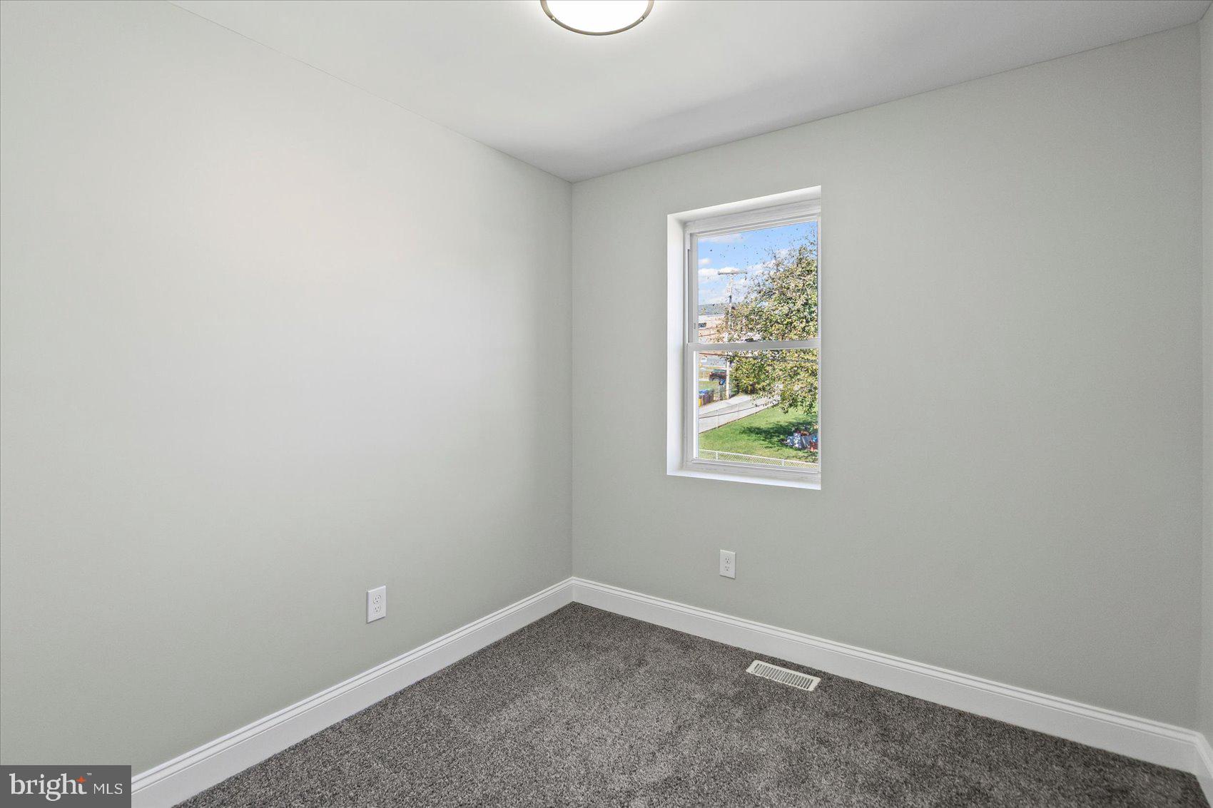 3814 Flowerton Road Baltimore, MD 21229 - Photo 25 of 42 an empty room with a window