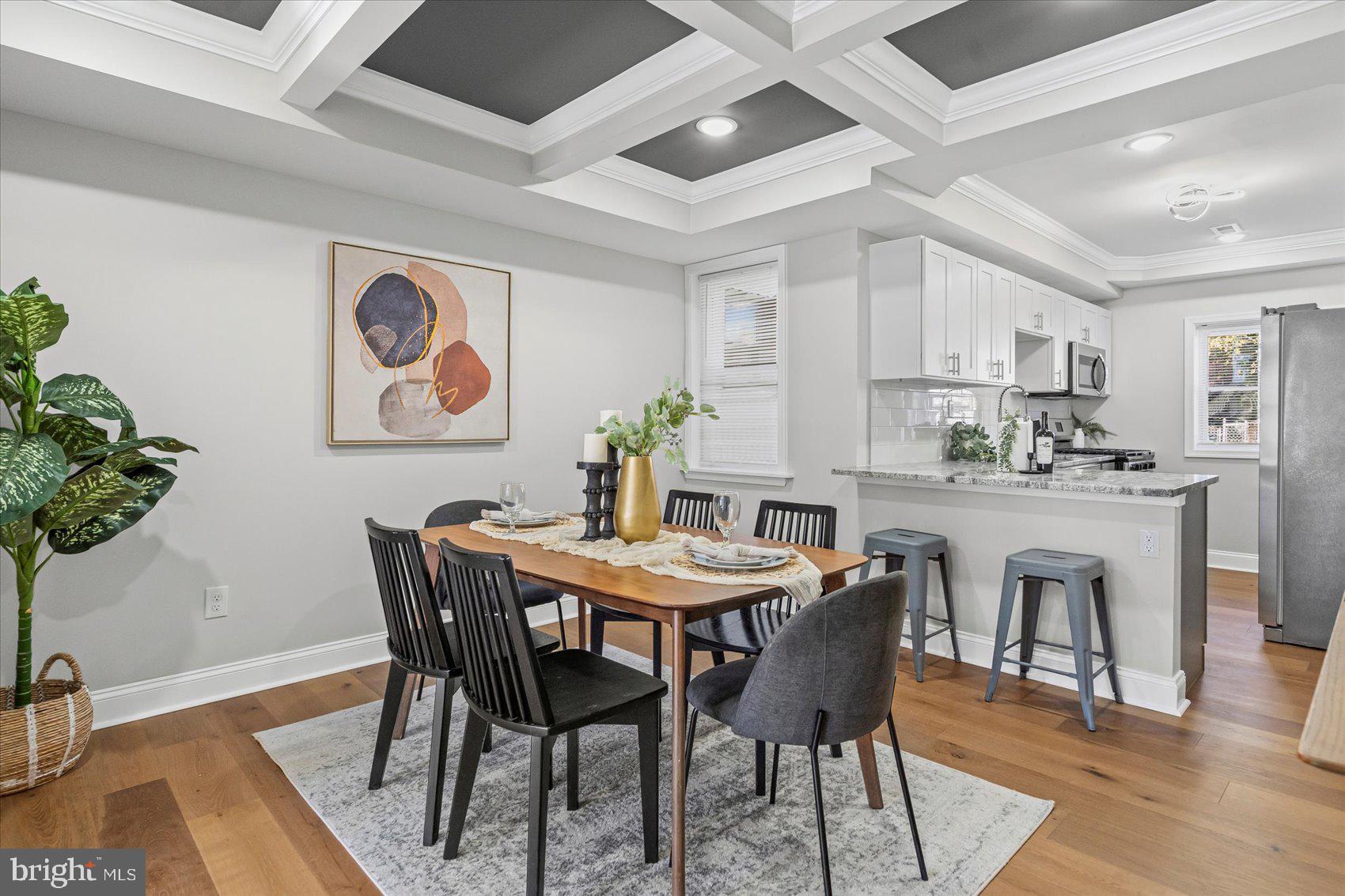 3814 Flowerton Road Baltimore, MD 21229 - Photo 6 of 42 a view of a dining room with furniture