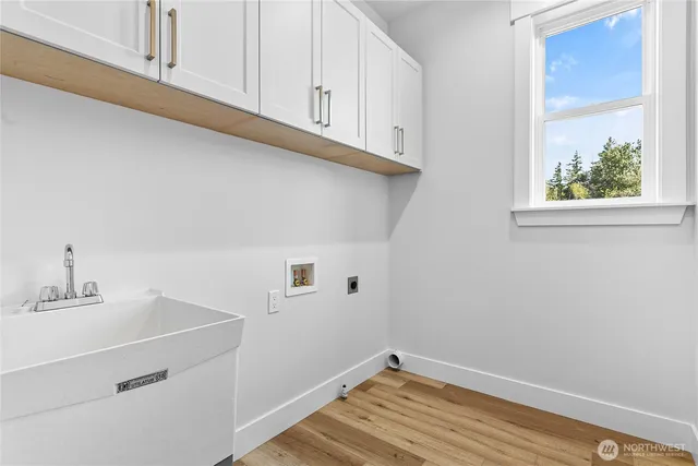 a bathroom with a sink and a window